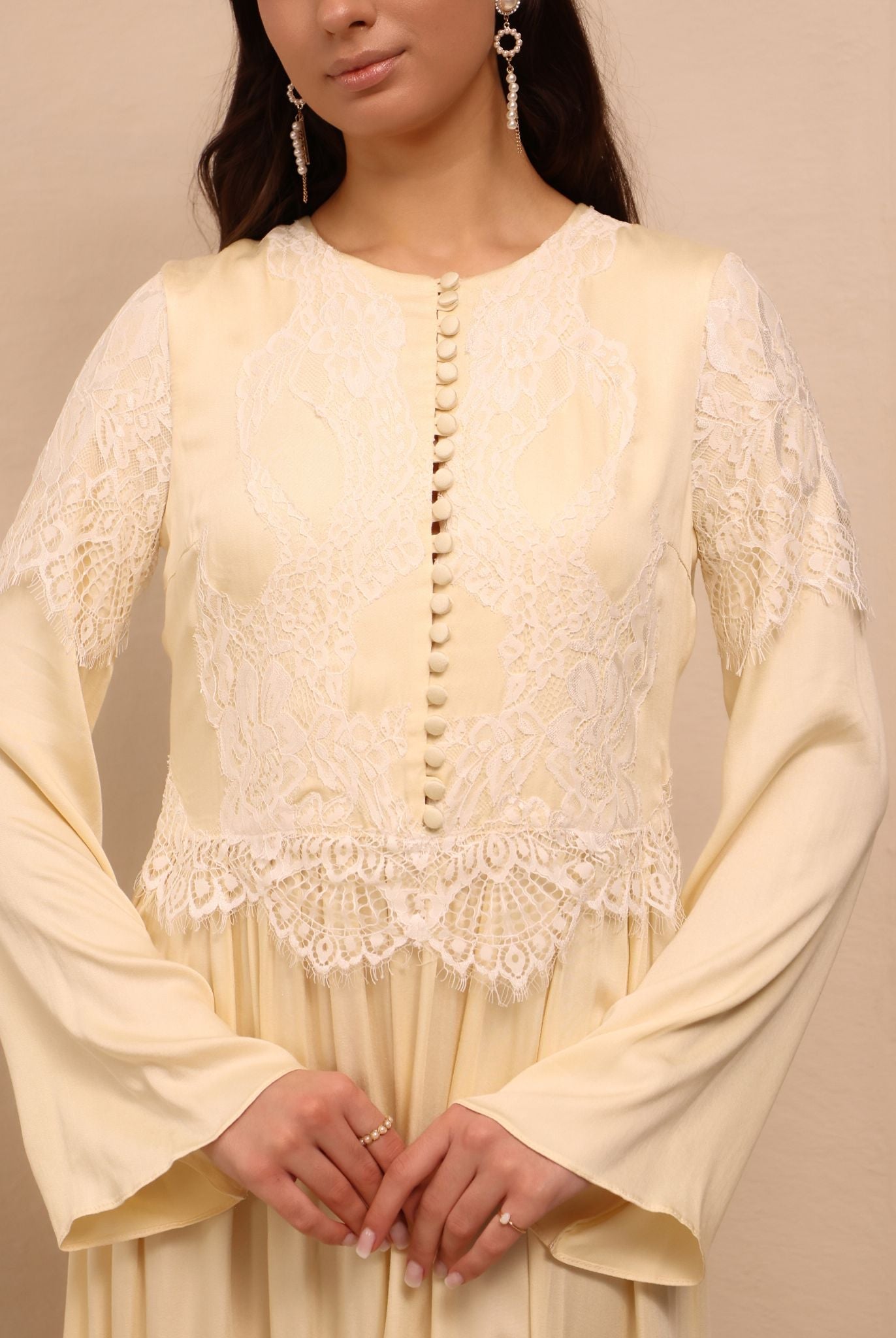 A detailed close-up of the Robe and Nightgown Set, focusing on fabric-covered buttons and delicate lace patterns.