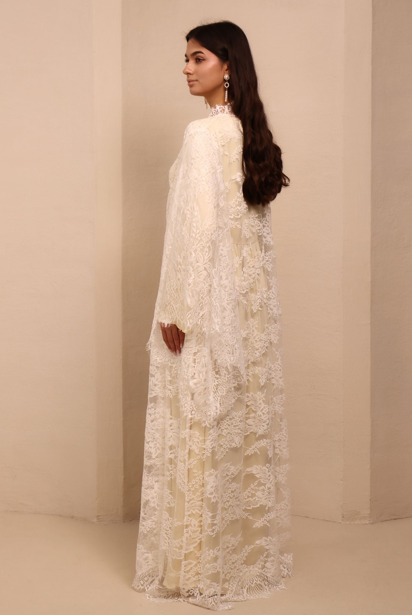 Side perspective of the modest ensemble, showcasing the breathable drape and refined silhouette of the long robe.