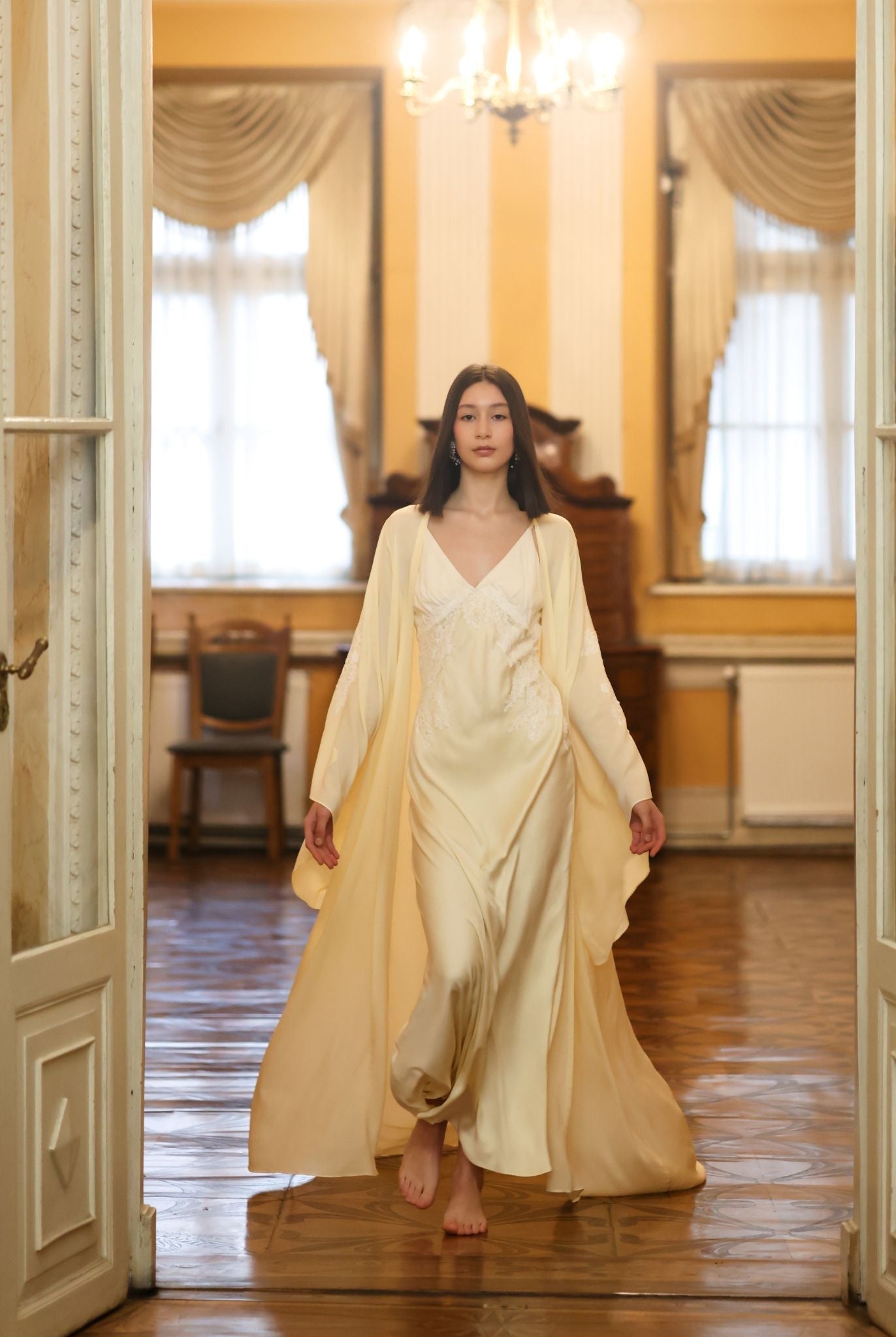 A creative shot of the Robe and Nightgown Set in a museum setting, capturing a timeless and refined aesthetic.