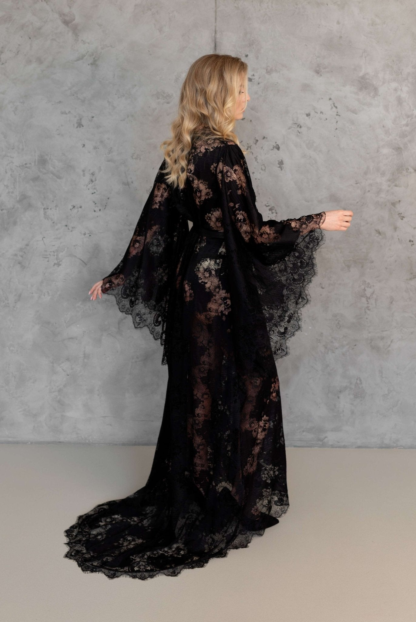 Back view of black lace robe with bell sleeves, floor-length – KÂfemme
