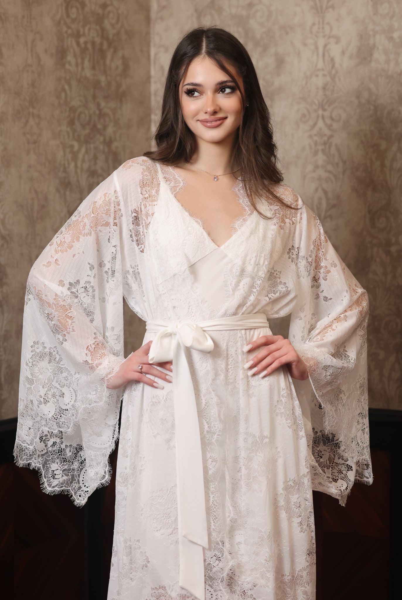 Mid-length shot focusing on the lace texture of the sleeves and the perfect balance of comfort and grace.