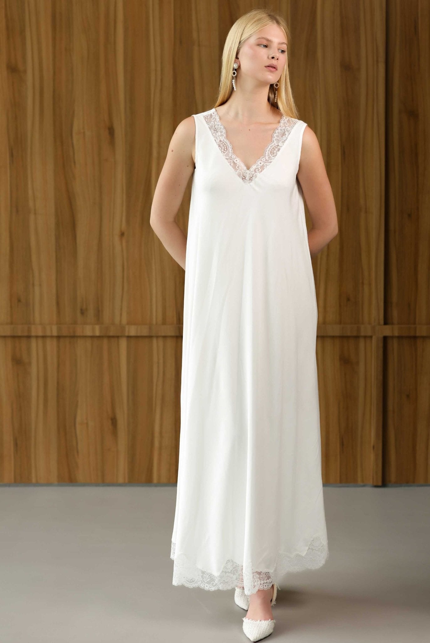 Front view of a white Robe and Nightgown Set nightdress, featuring a loose fit and delicate lace-trimmed neckline.