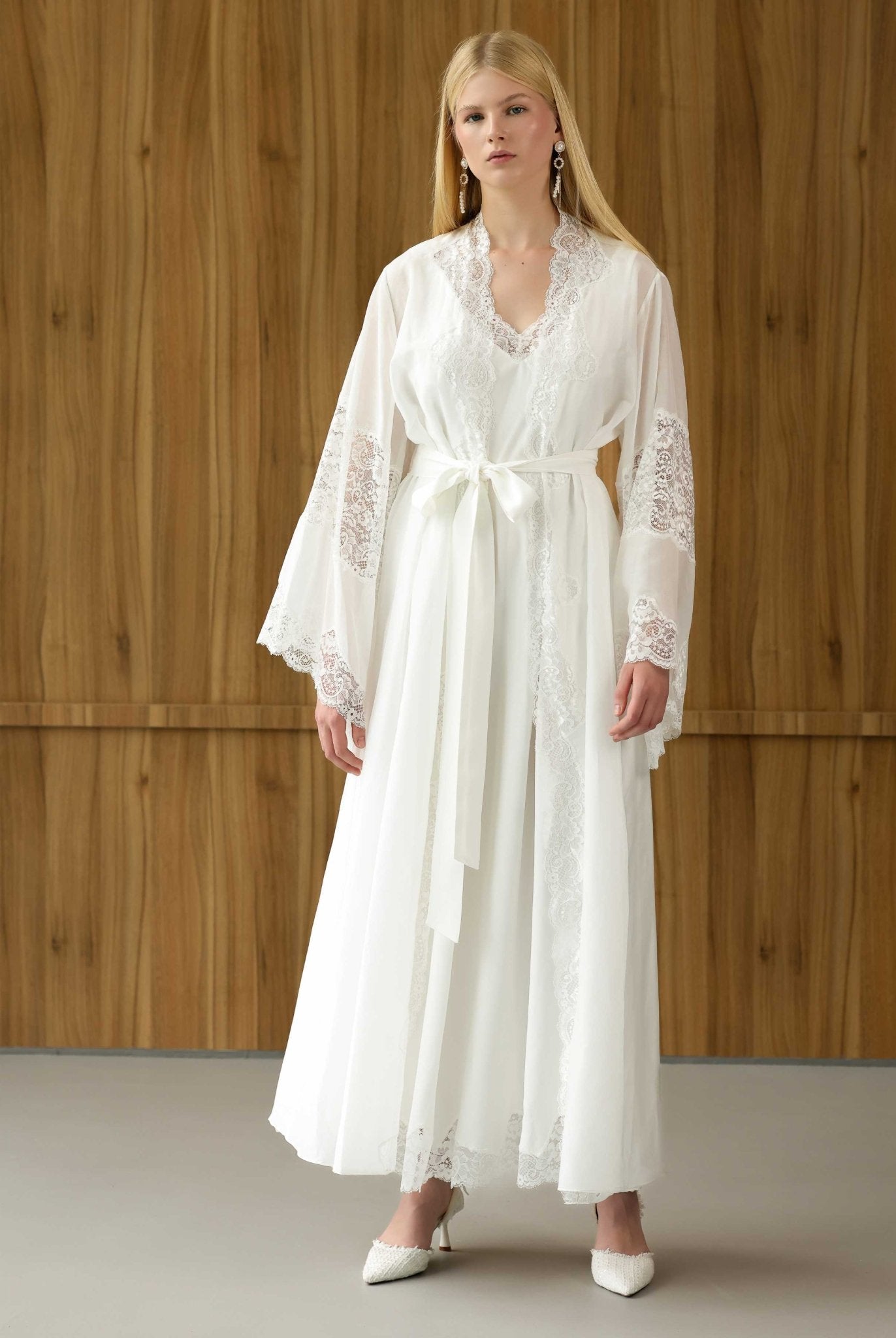 White maternity robe and gown in motion, showing the airy, flowing silhouette of the lightweight natural fabric.