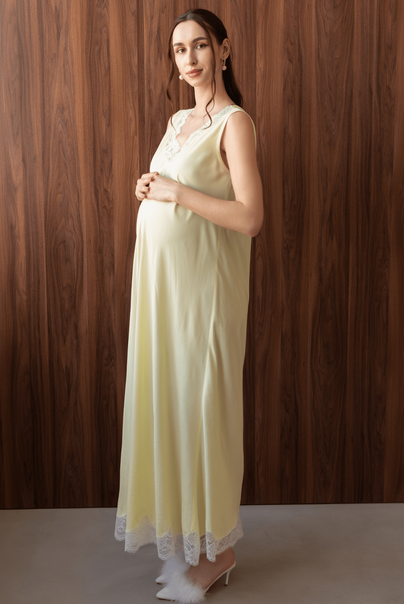 Side profile in a yellow cotton-silk nightdress, focusing on the comfortable loose fit.