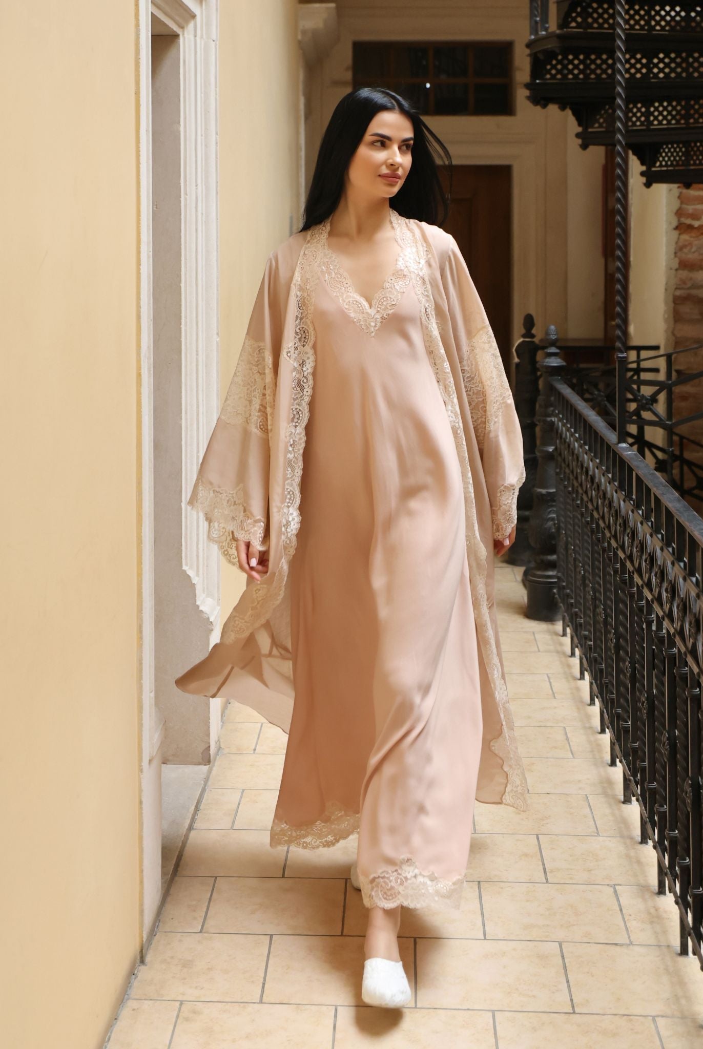 A dynamic motion shot of the Robe and Nightgown Set, capturing the breathability and effortless style of the silk-cotton fabric.