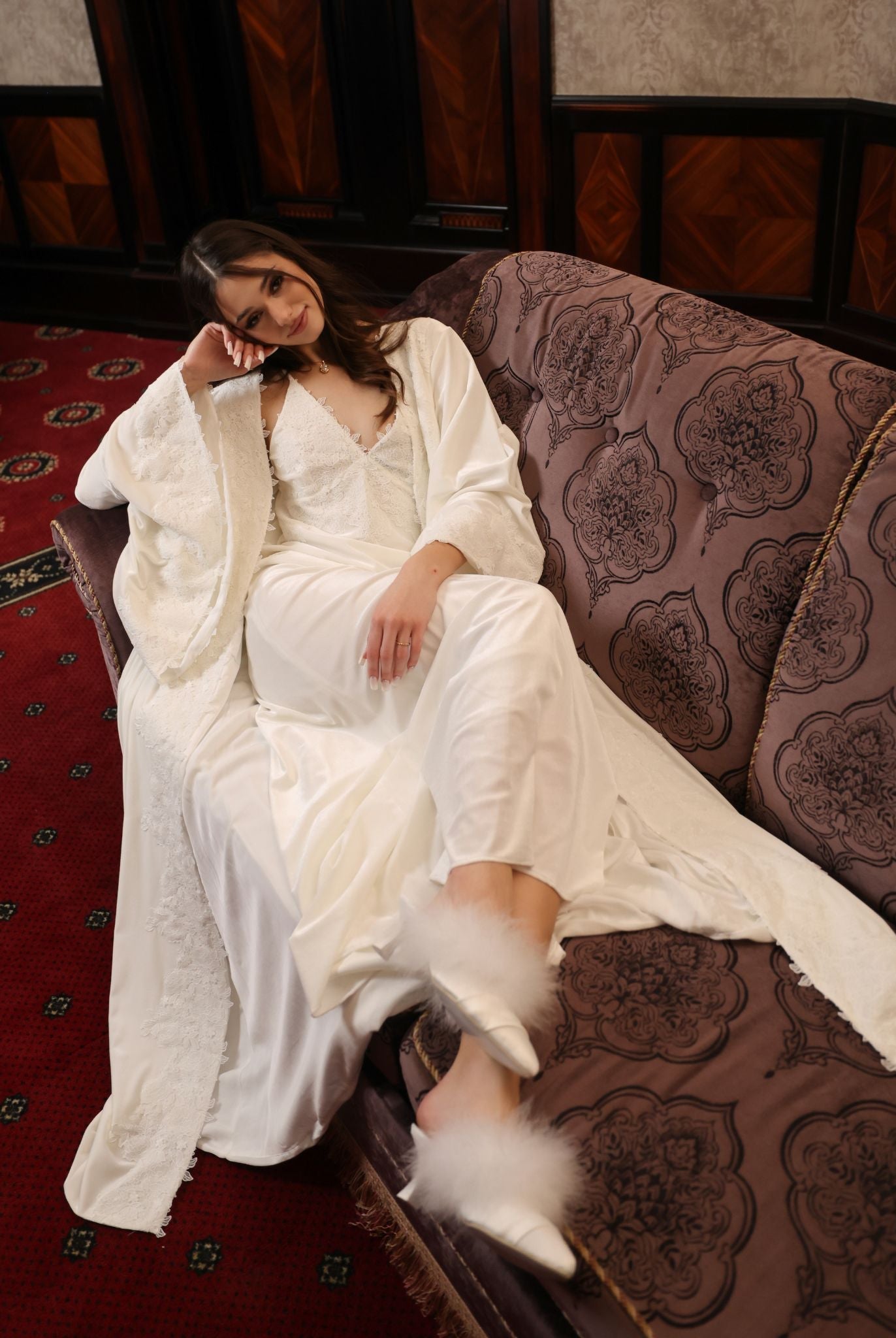A creative shot of the luxurious lounge set, highlighting the soft drama and plush texture of the pearl velvet.