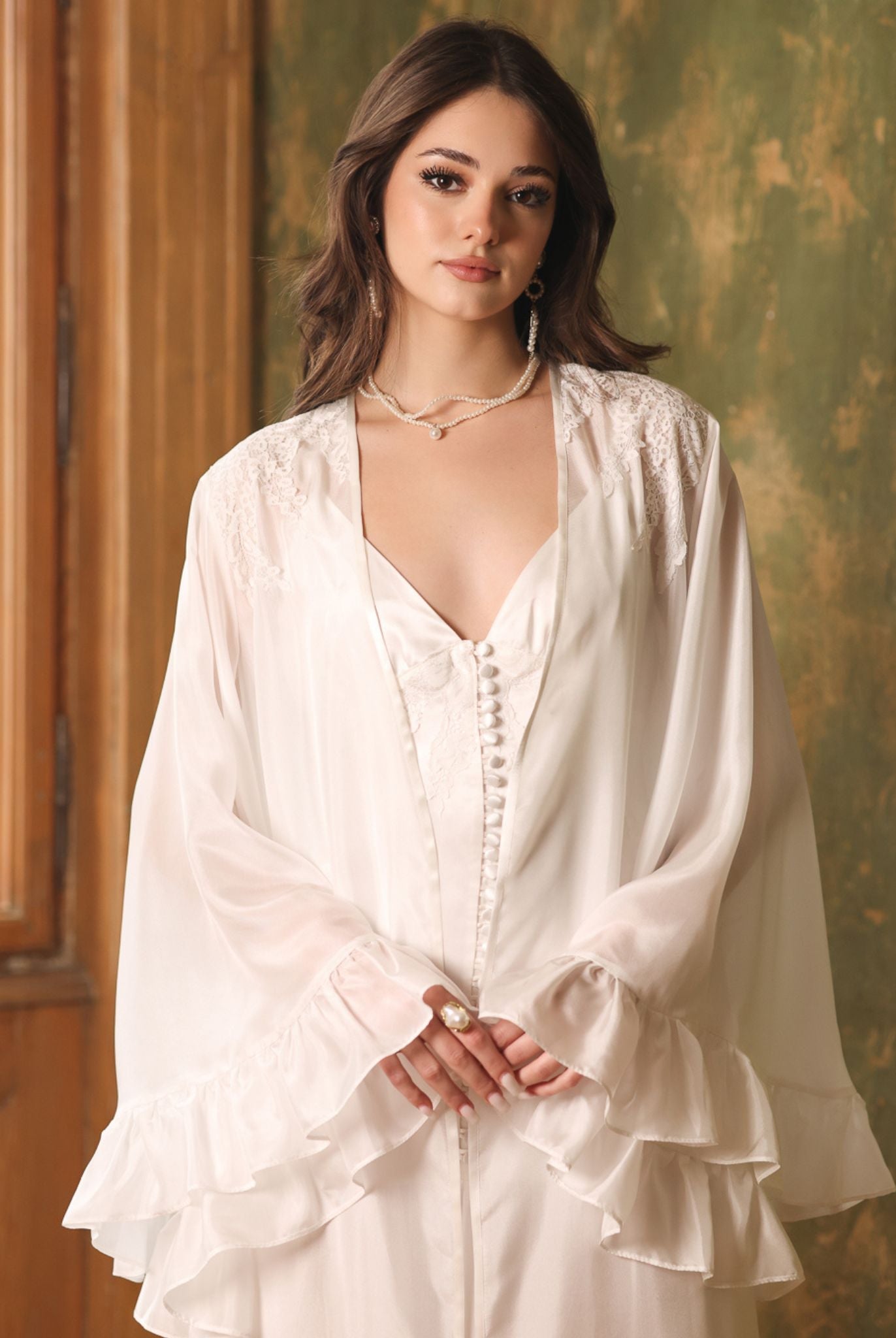 Portrait-length shot highlighting the flattering neckline and the soft romantic feel of the silk ensemble.