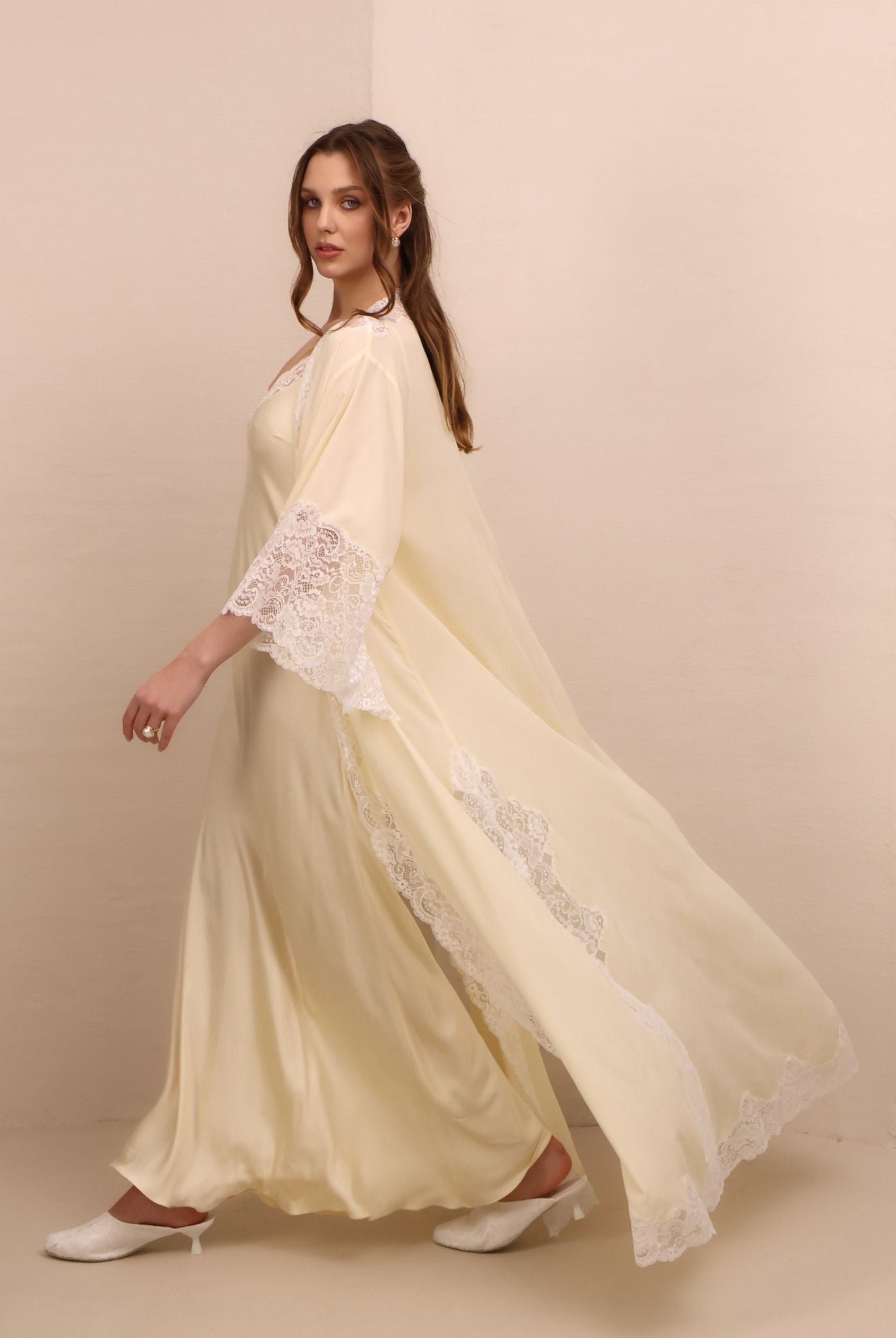 A dynamic side view of the Robe and Nightgown Set in motion, capturing the flowing chiffon and sweeping silhouette.