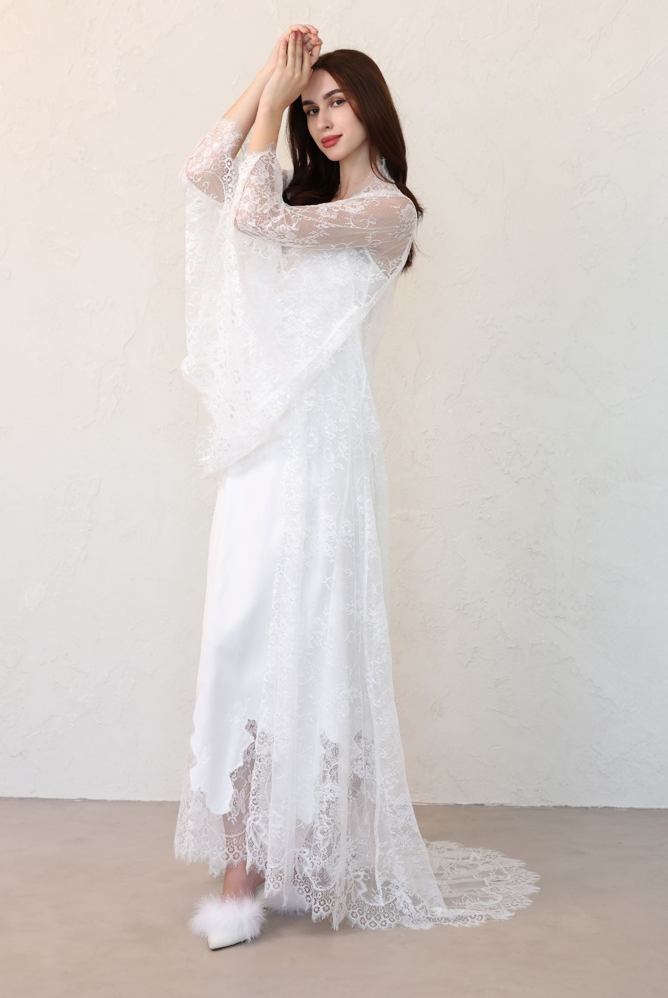 Elegant bridal look featuring robe cinched at the waist