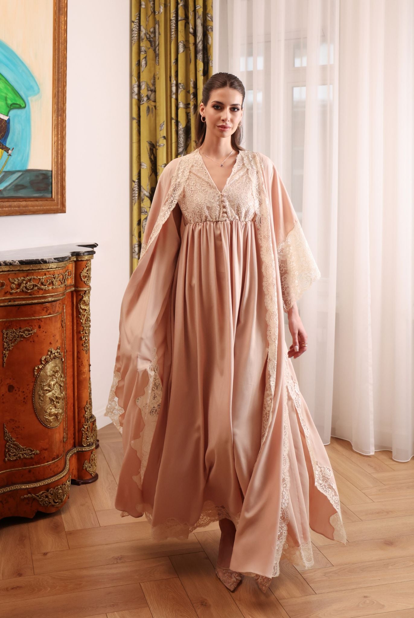 A full-length shot of the Robe and Nightgown Set in motion, capturing the flowing fabric and graceful silhouette.