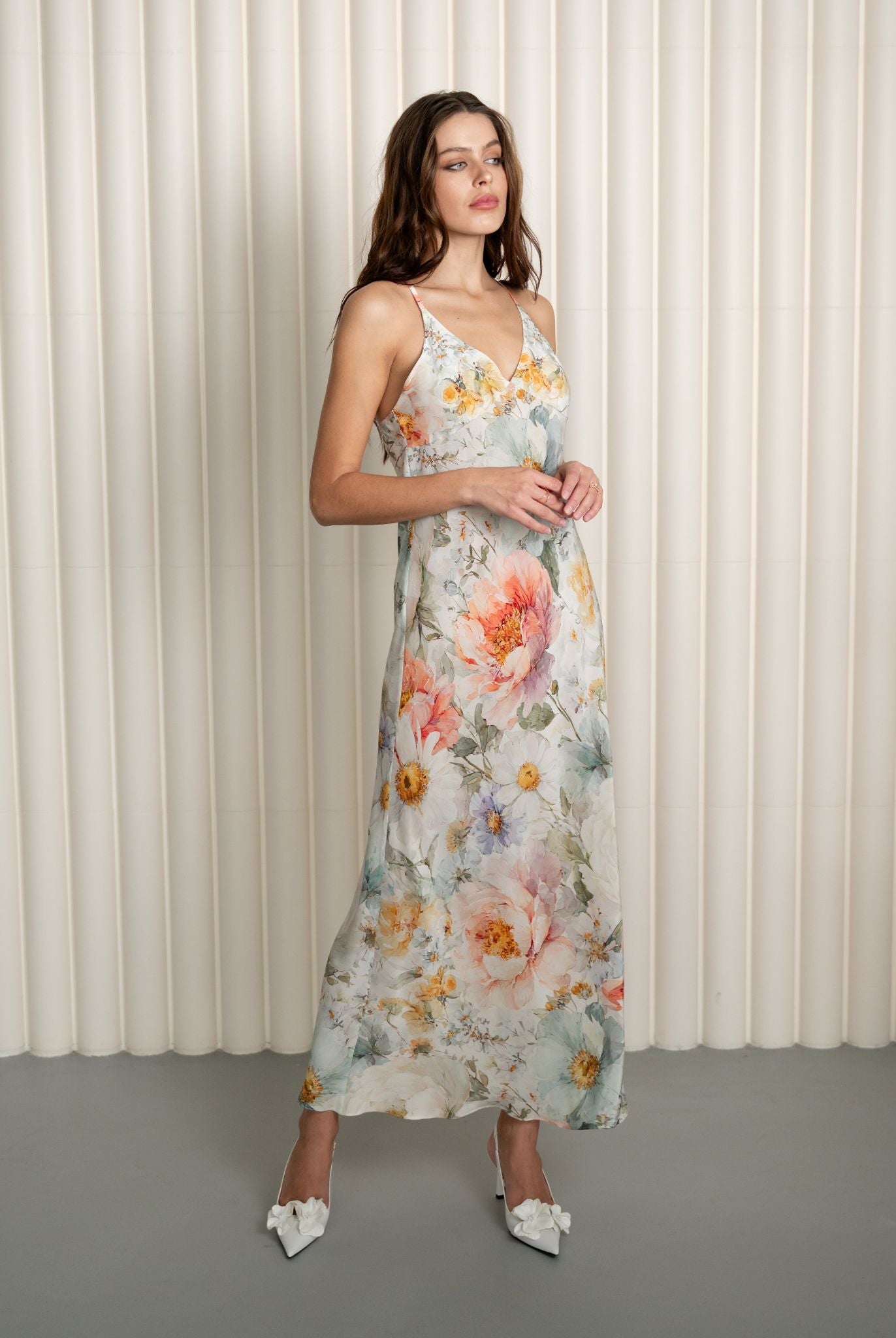 Side view of open-back floral silk nightgown
