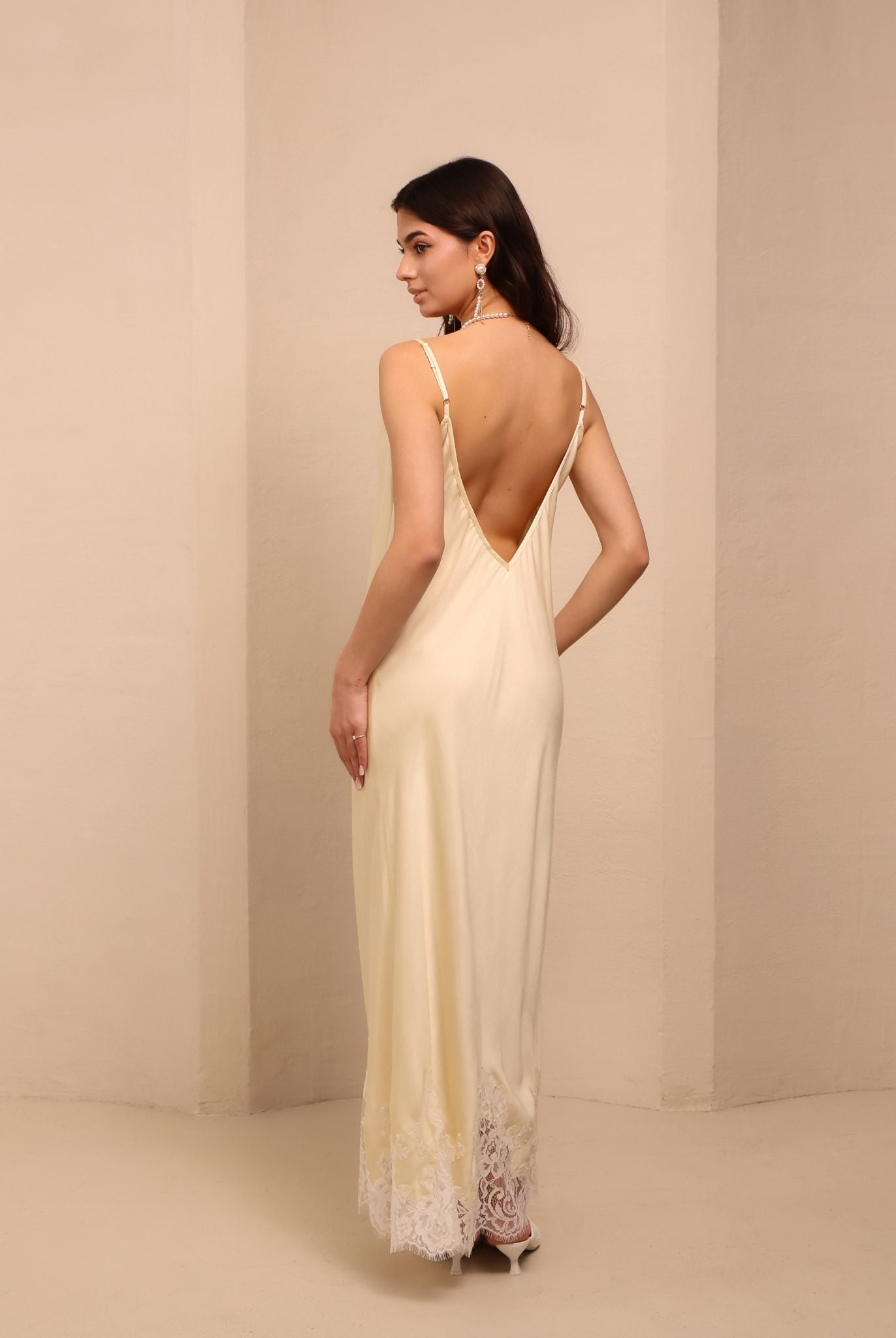 Rear view of the nightgown, highlighting the mid-open V-cut back for an intimate and elegant look.