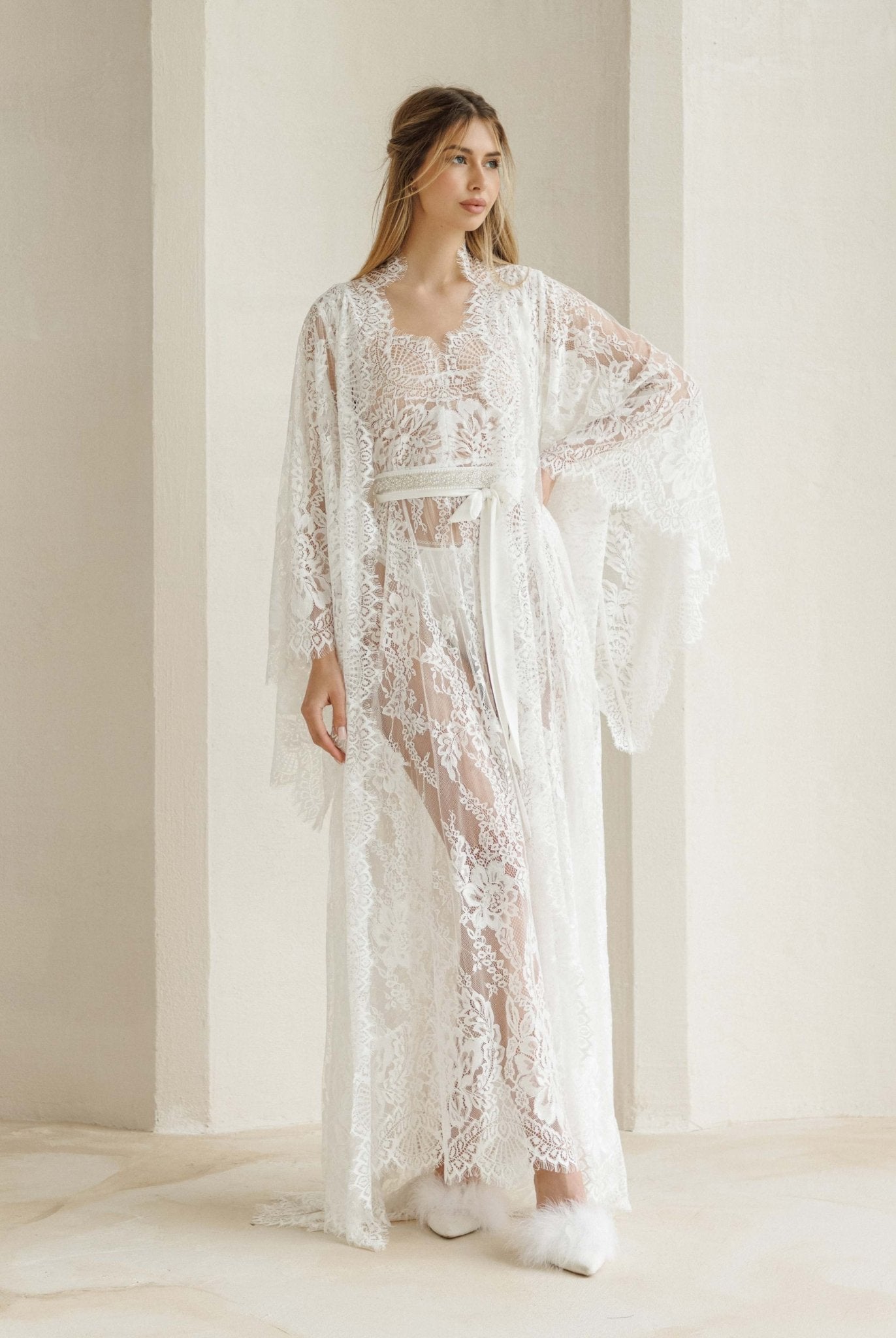 The complete ensemble shown in a wrap-over style, creating a bold yet refined look for memorable days.