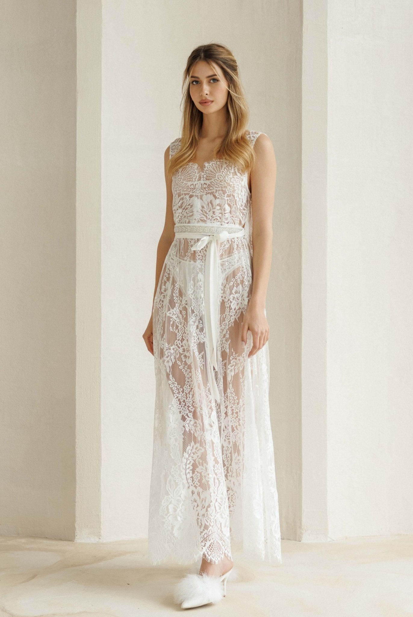 Front view of the delicate nightgown featuring a soft tie at the waist to highlight the figure gracefully.
