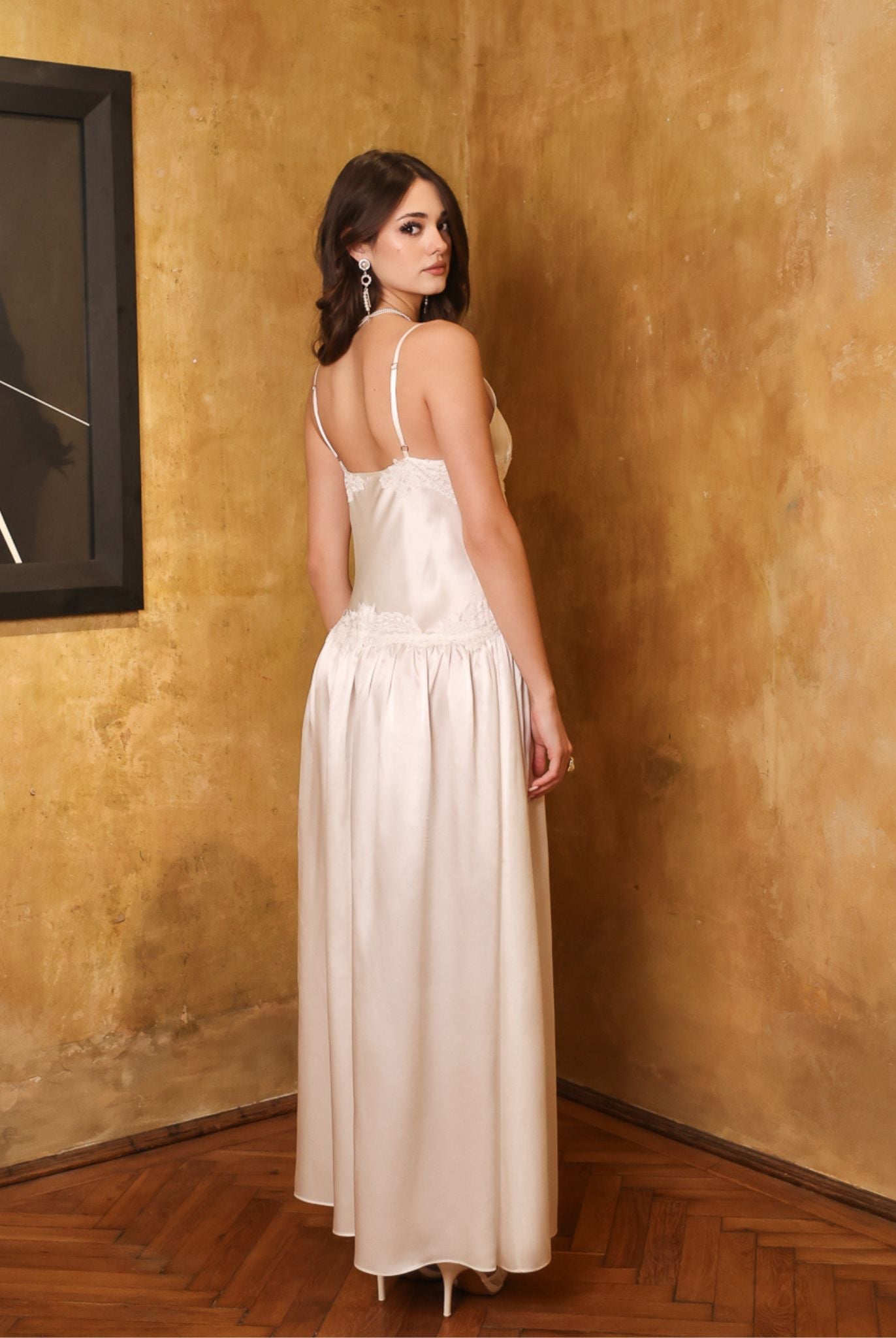 Back view of the silk satin nightdress, highlighting the elegant lines and the sophisticated bridal-style silhouette.