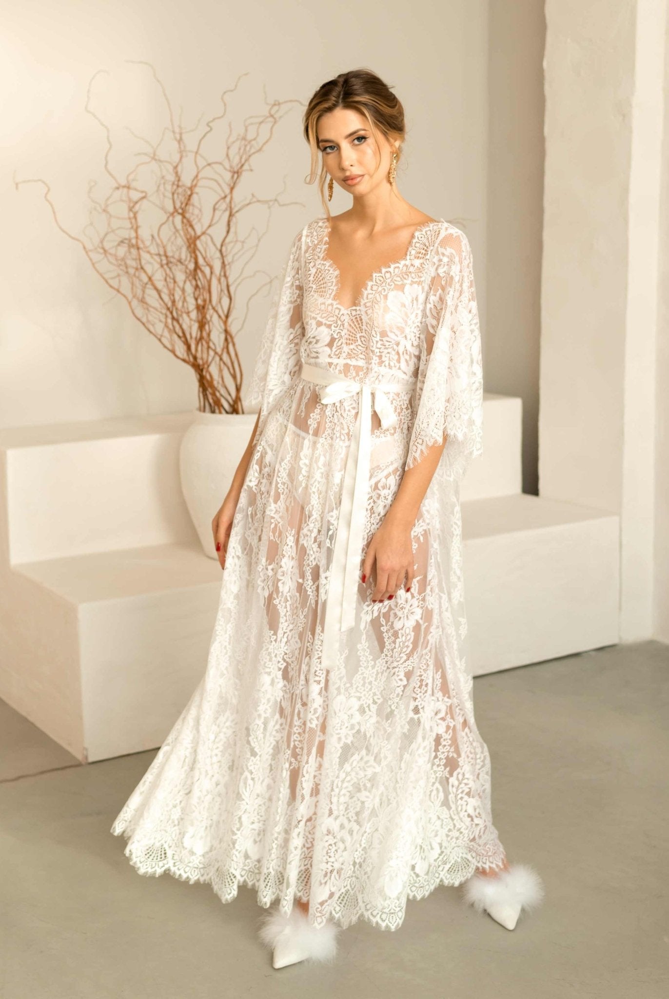 Full-length shot of the model in the Flora nightdress, with the hem flowing beautifully to showcase its voluminous design.