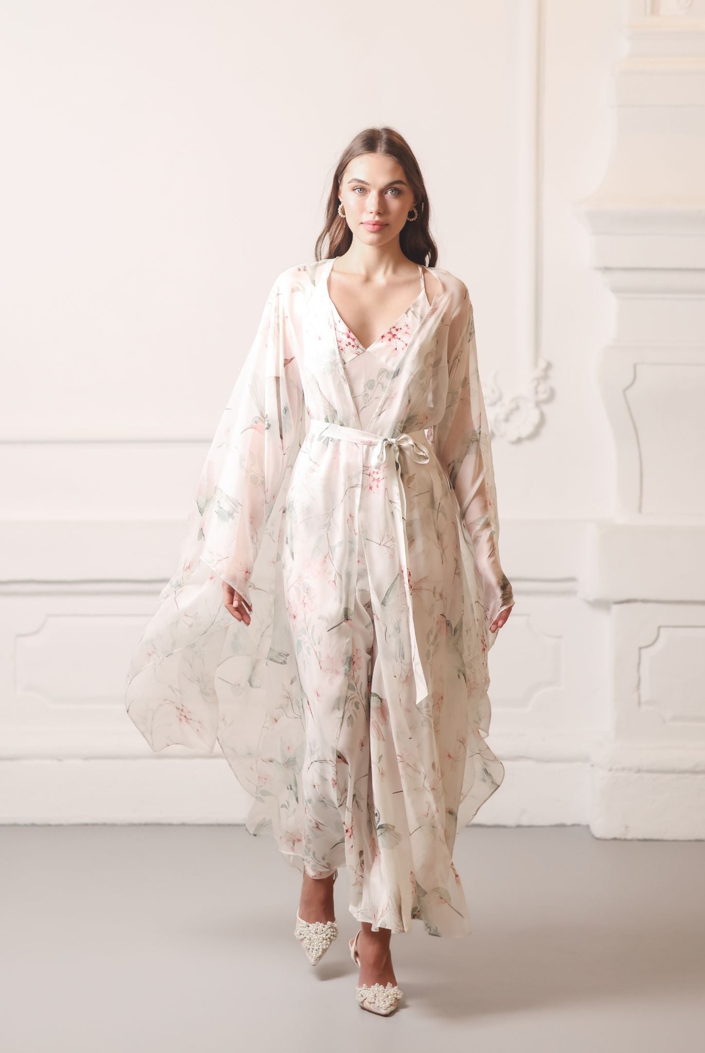 Flowing Silk Robe and Nightgown Set with an exclusive floral print, shown in motion for a romantic look.