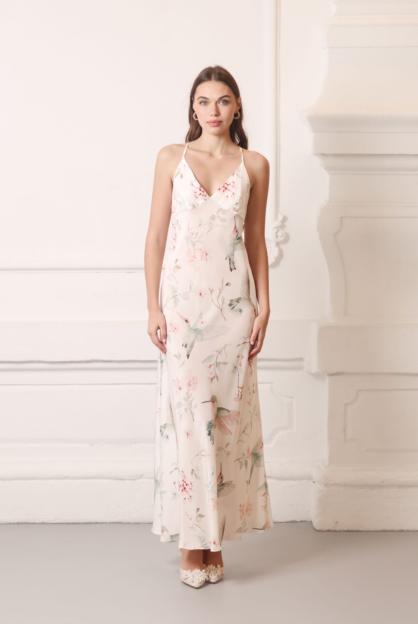 Front view of a structured silk crepe nightgown featuring a delicate floral pattern and a flattering silhouette.