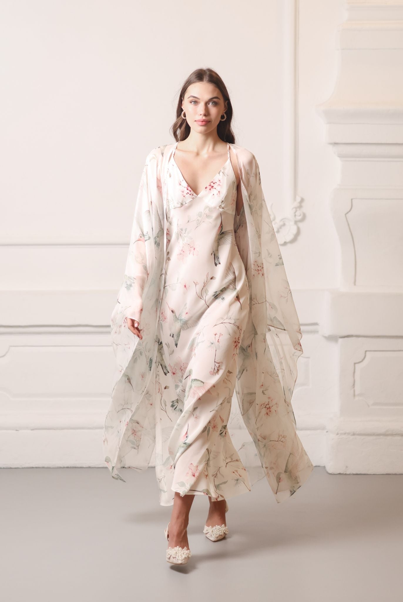 Full-length shot of the sheer silk robe layered over a matching gown, creating a luminous and luxury home look.