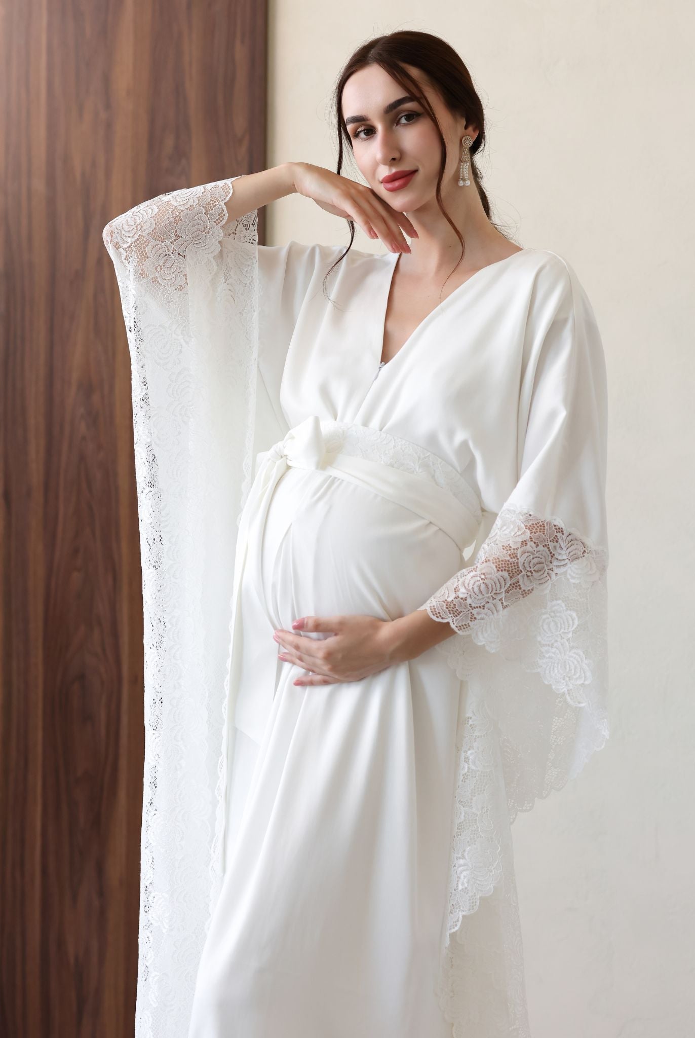 Flowing white cotton robe with long bishop sleeves, ideal for special moments.