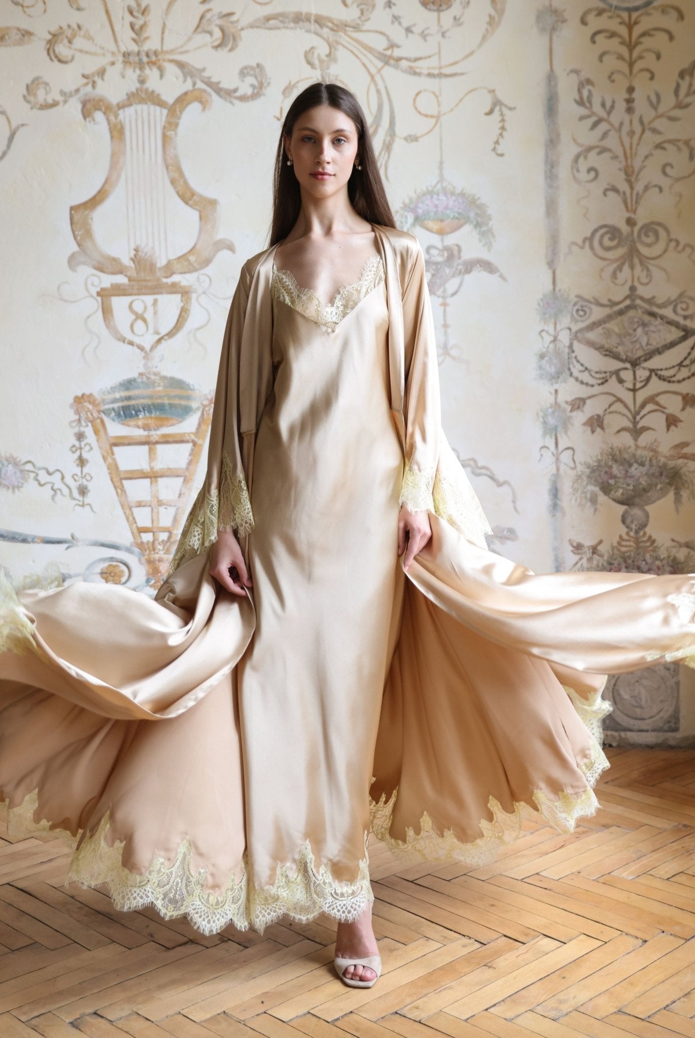 A dynamic shot of the Satin Robe and Nightgown Set, capturing the flowing movement of the silky fabric.