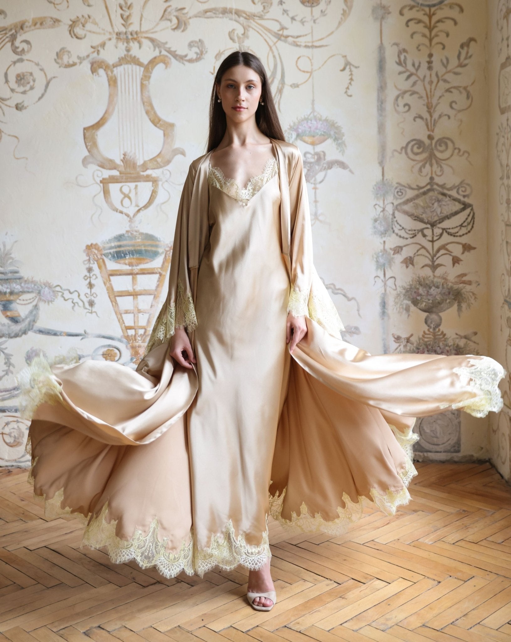 A dynamic shot of the Satin Robe and Nightgown Set, capturing the flowing movement of the silky fabric.