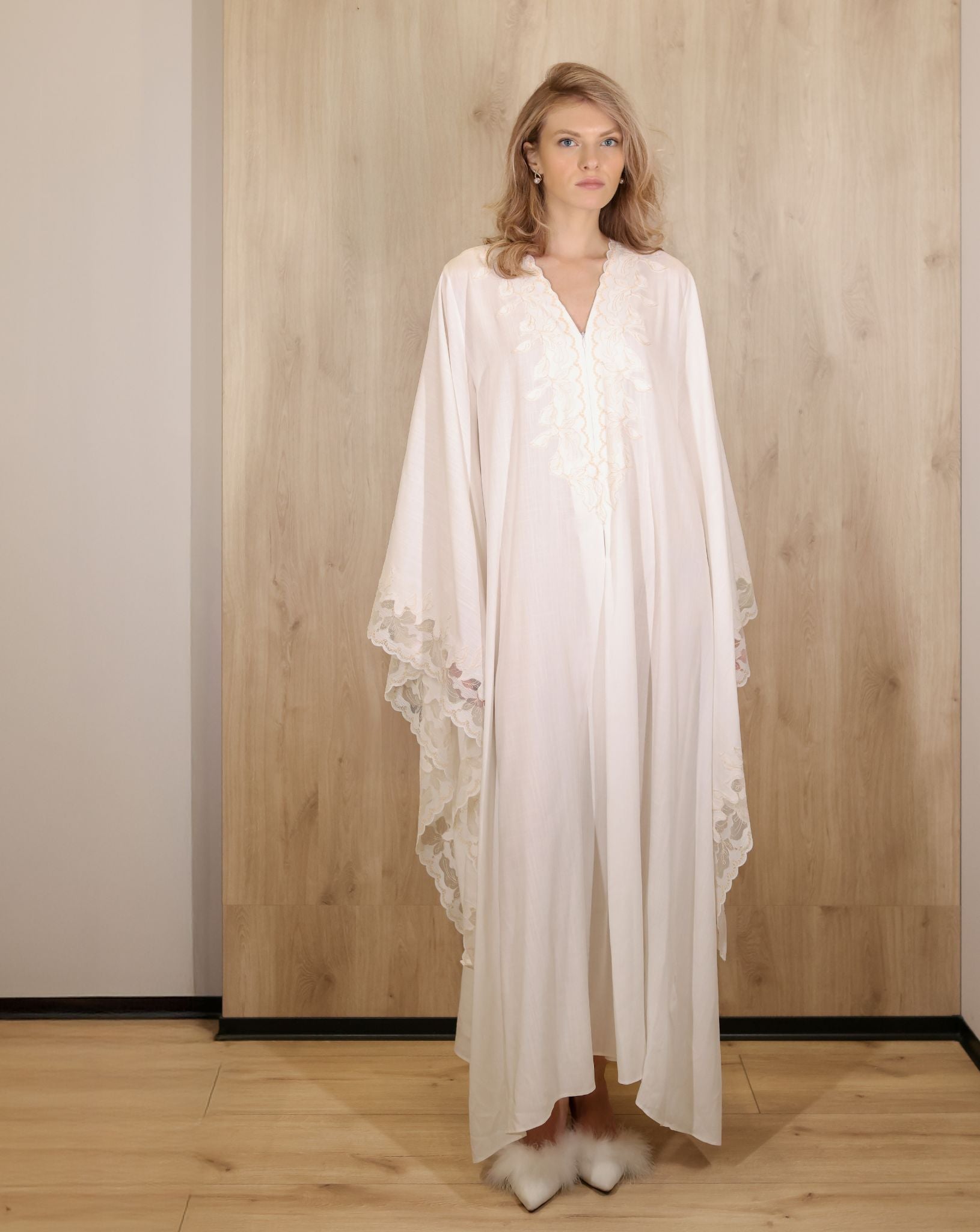 Full-length shot of the Cotton Kaftan without a belt, emphasizing the loose fit and freedom of movement.