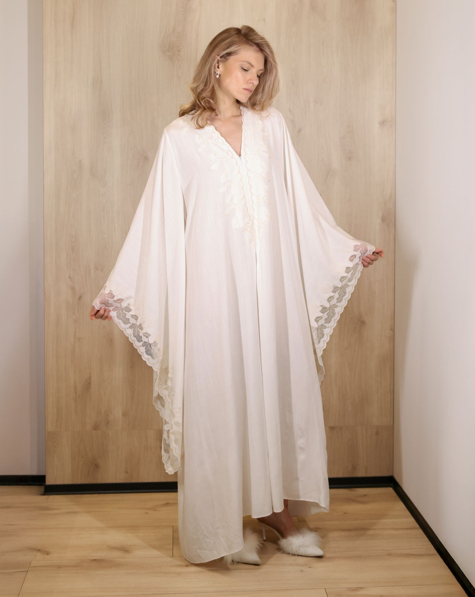 Frontal view with arms spread wide, displaying the lightweight fabric and the hidden zipper for nursing access.