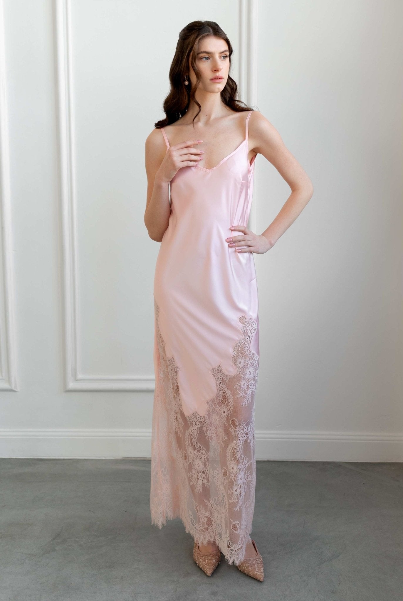 Soft pink lace nightgown with floral appliqués, styled with romantic waves