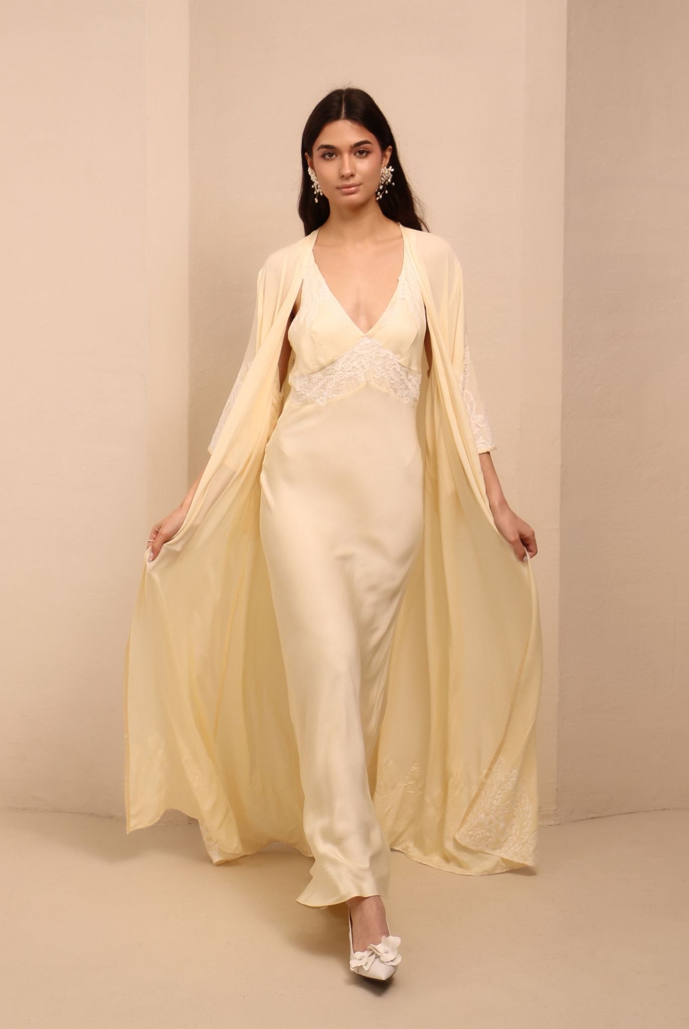 A full-length motion shot of the Robe and Nightgown Set, capturing the breathable and fluid drape of pure viscose.