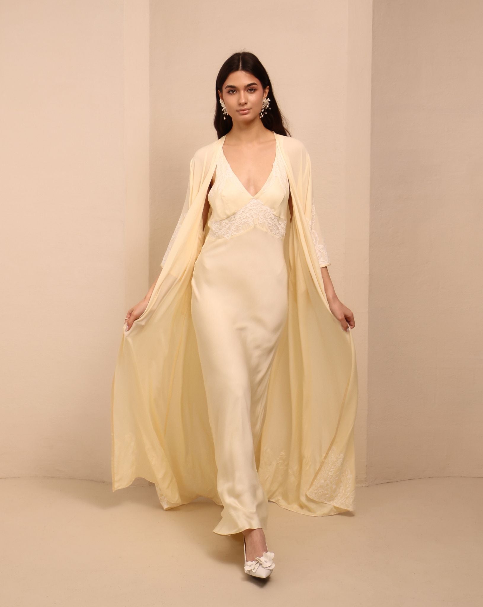 A full-length motion shot of the Robe and Nightgown Set, capturing the breathable and fluid drape of pure viscose.