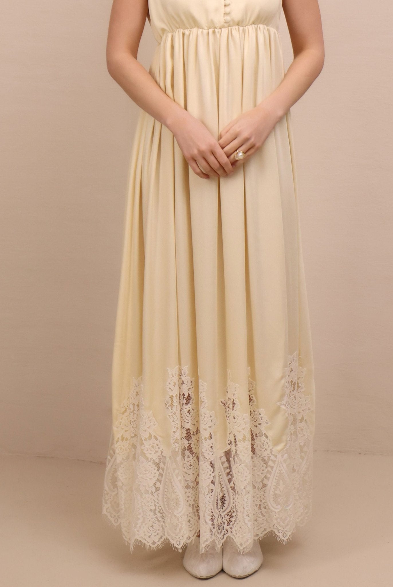 A mid-length shot focusing on the delicate lace detailing and the fluid movement of the breathable fabric.