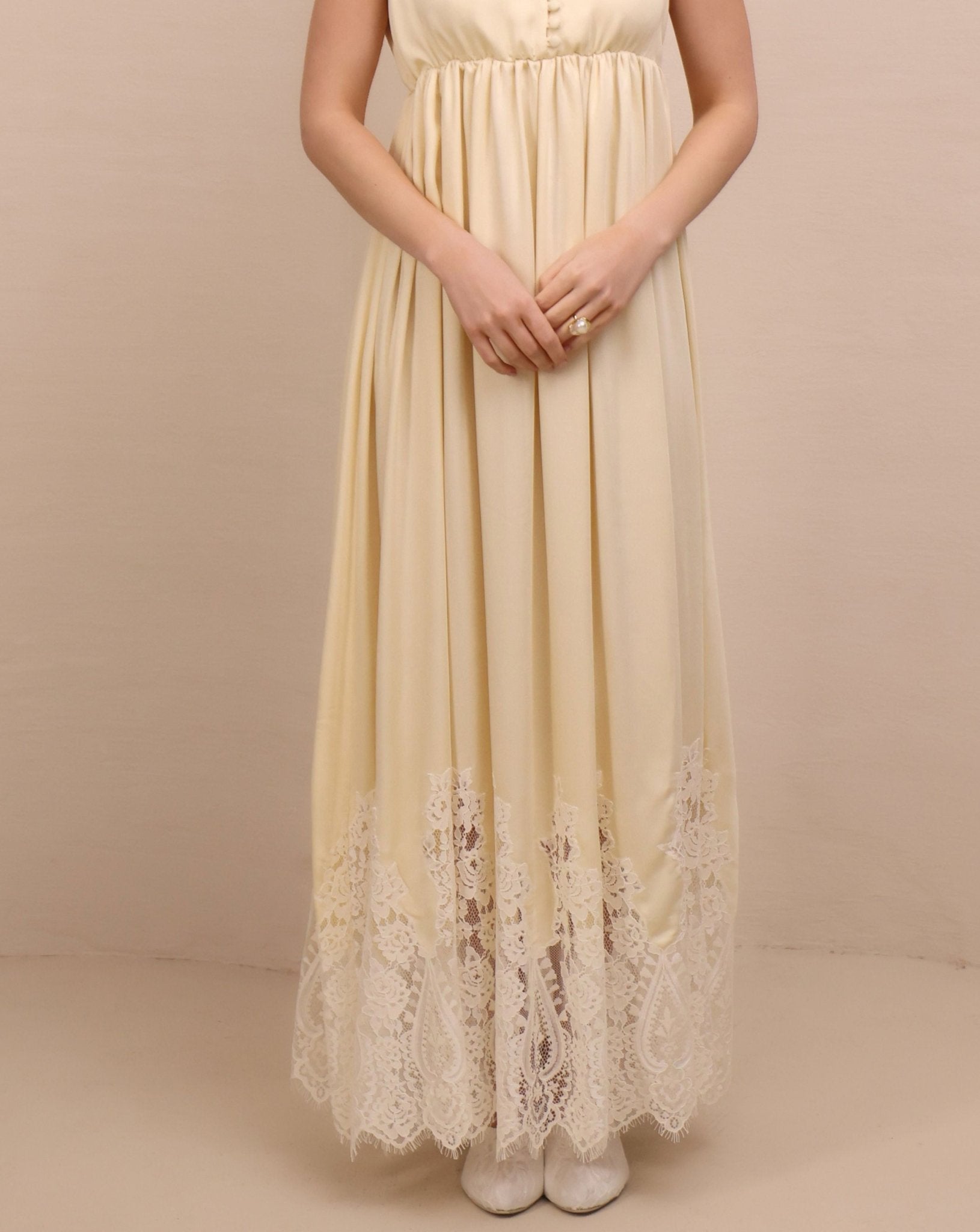 A mid-length shot focusing on the delicate lace detailing and the fluid movement of the breathable fabric.