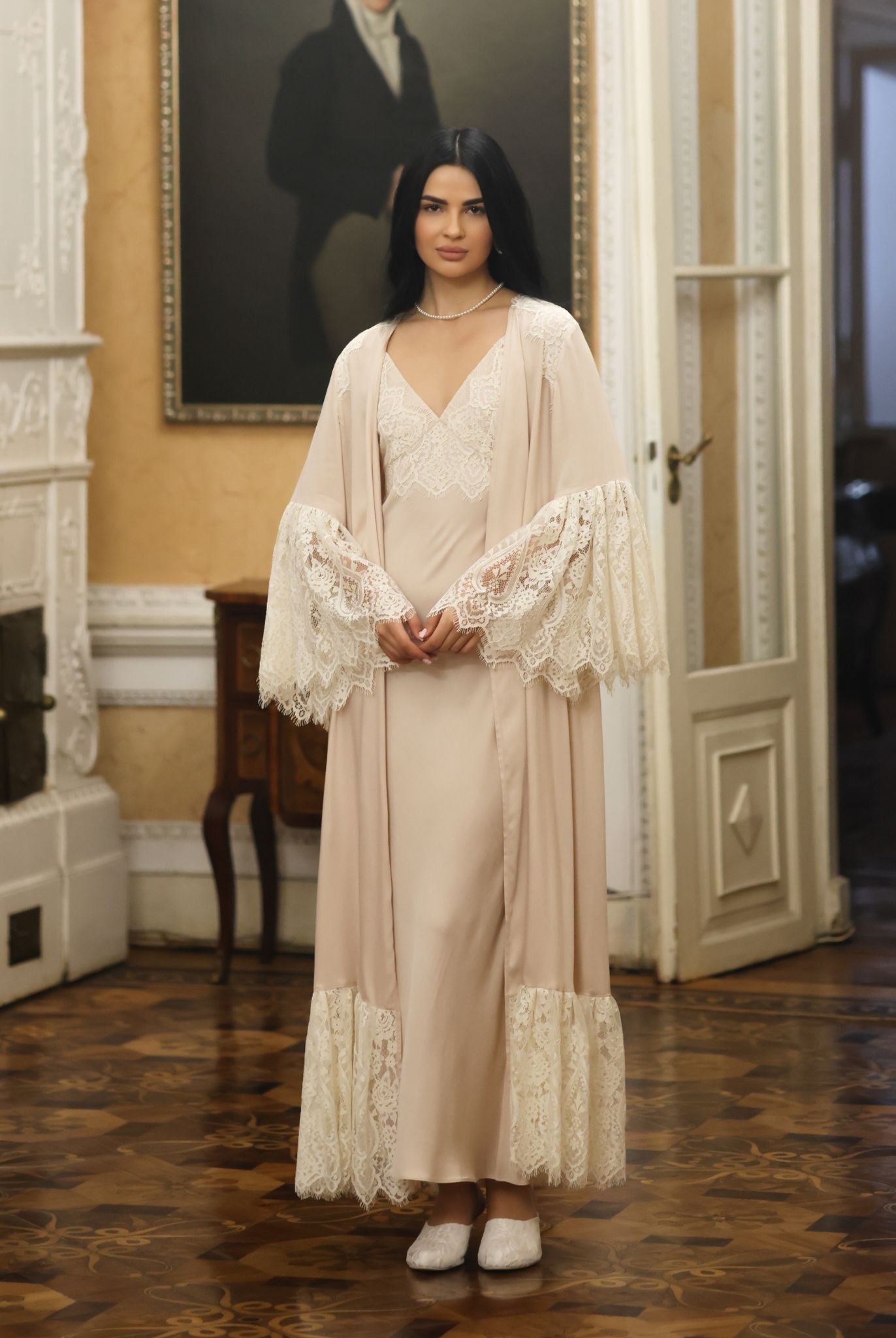 A full-length view of the Robe and Nightgown Set, showcasing the graceful silhouette and dramatic lace bell sleeves.