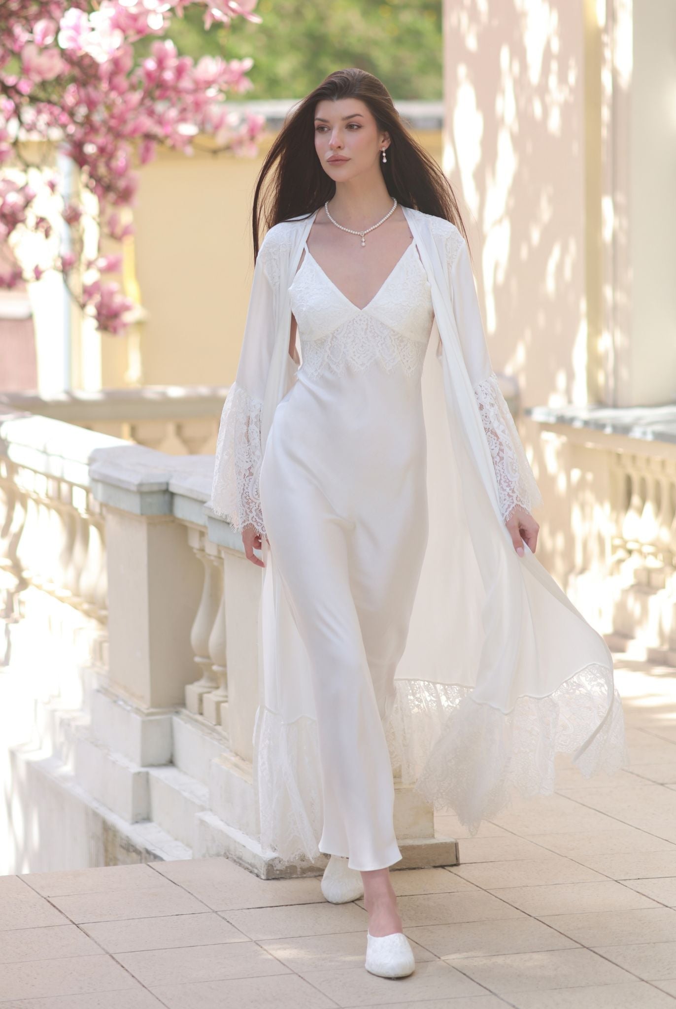 A dynamic motion shot of the set, showcasing the fluid movement of the rayon fabric and lace-trimmed hem.