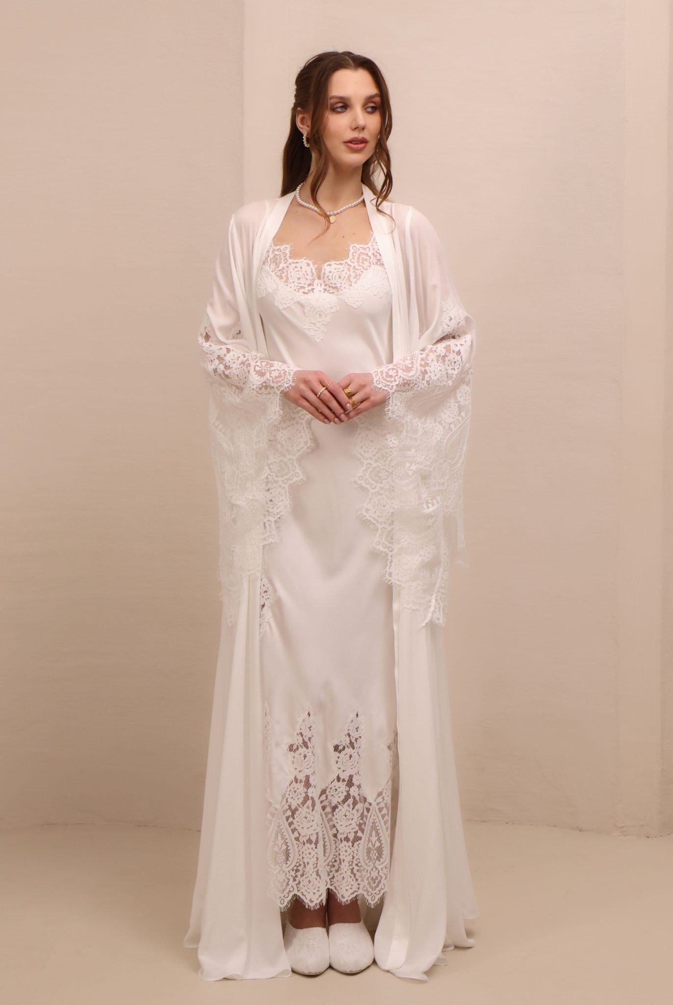 A serene static view of the open ensemble, showcasing the intricate lace along the wide, flowing sleeves.