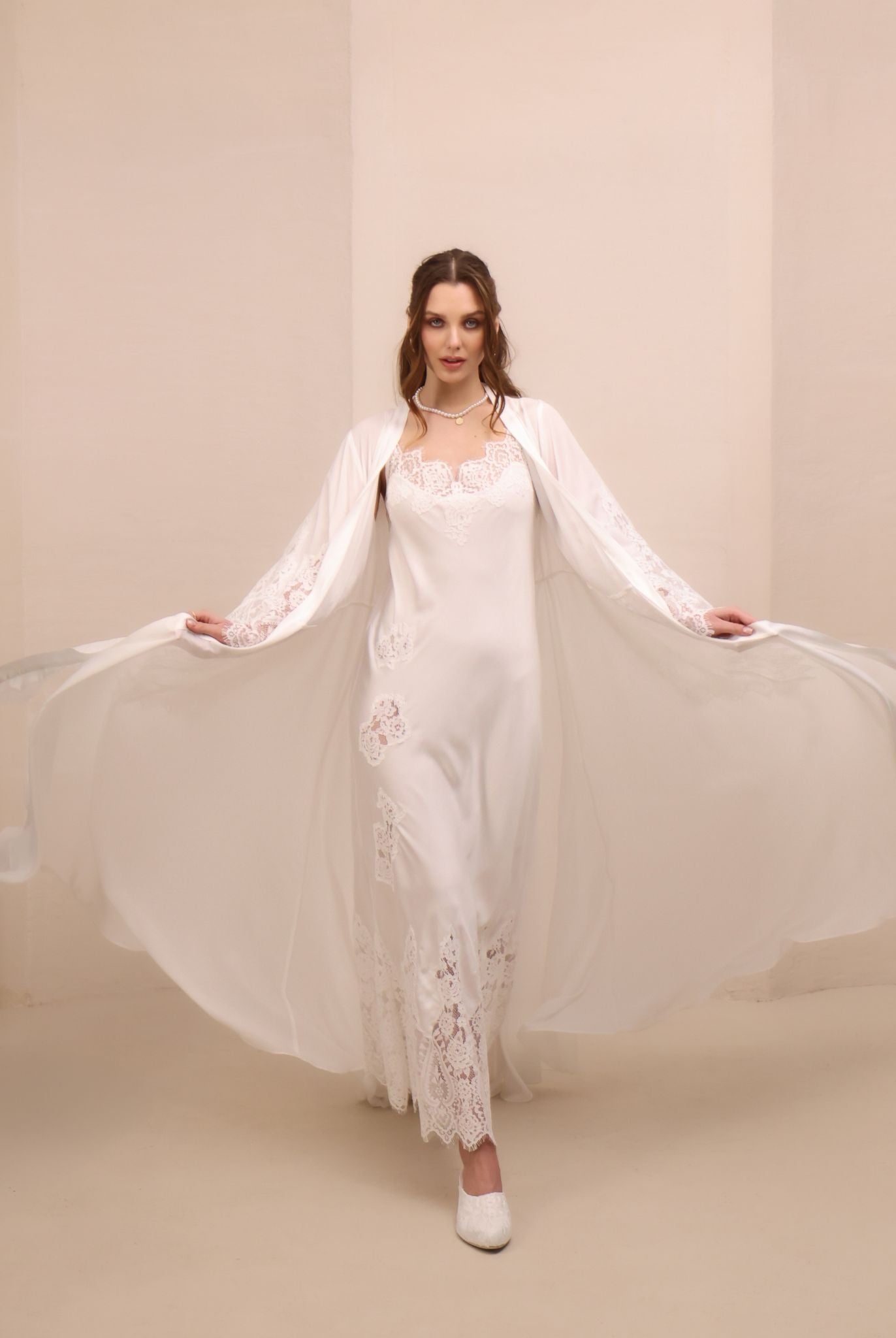 A dynamic motion shot of the Robe and Nightgown Set, capturing the light and airy feel of the semi-sheer fabric.
