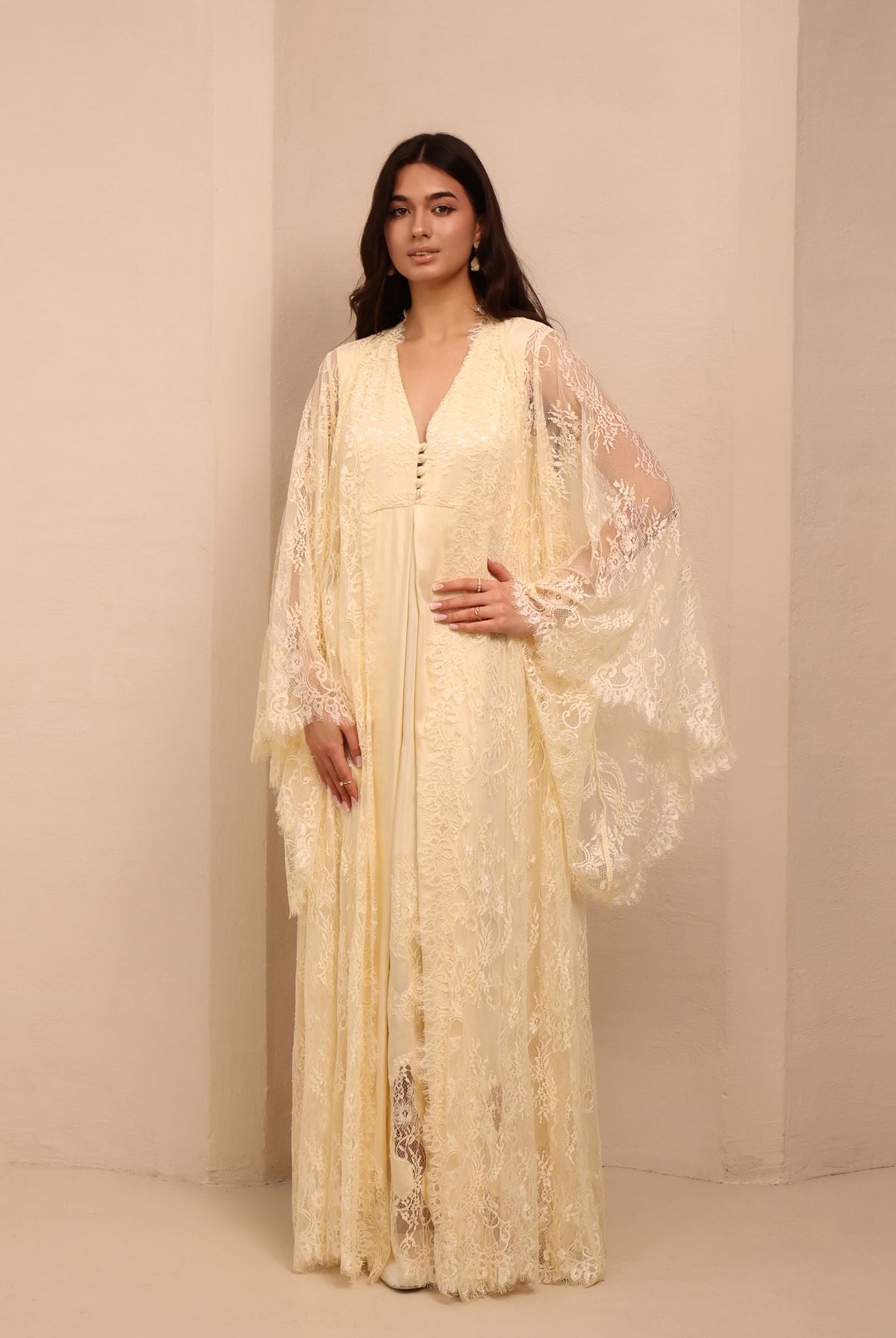 A full-length shot of the Maternity Robe and Nightgown Set, showcasing the wide lace sleeves and elegant drape.