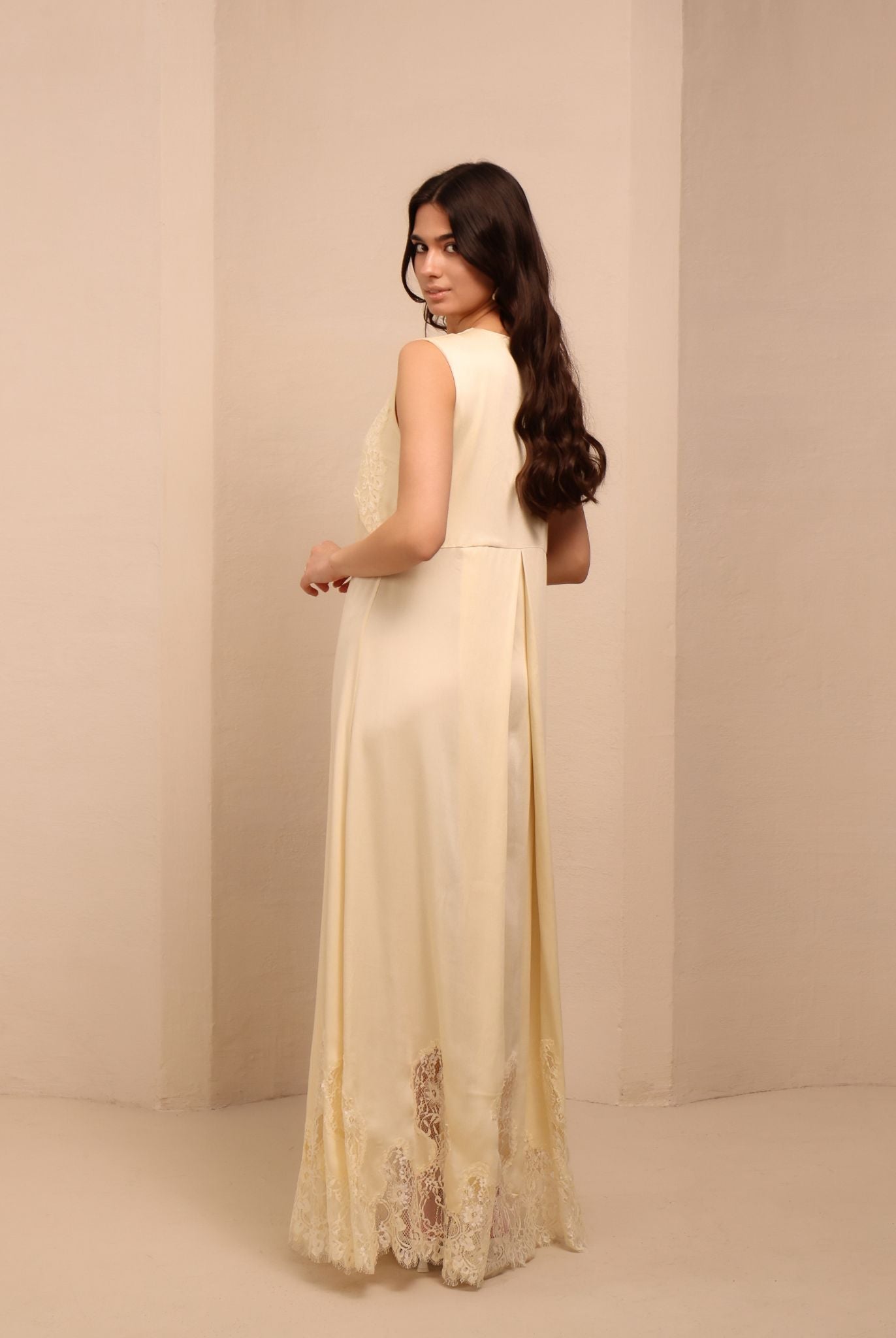 Side perspective of the maternity nightgown, showcasing its simple silhouette and the natural softness of rayon.