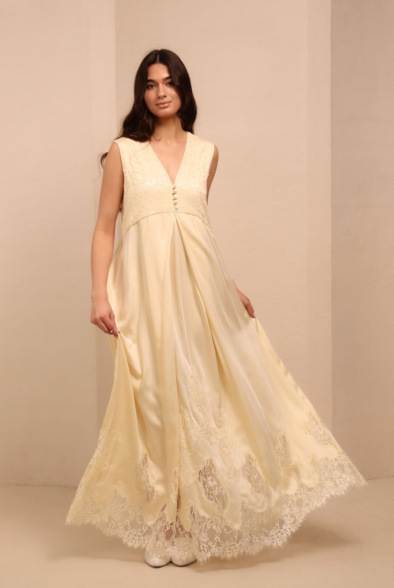 A motion shot of the nightdress in a vanilla shade, highlighting the light rayon fabric that breathes with every step.