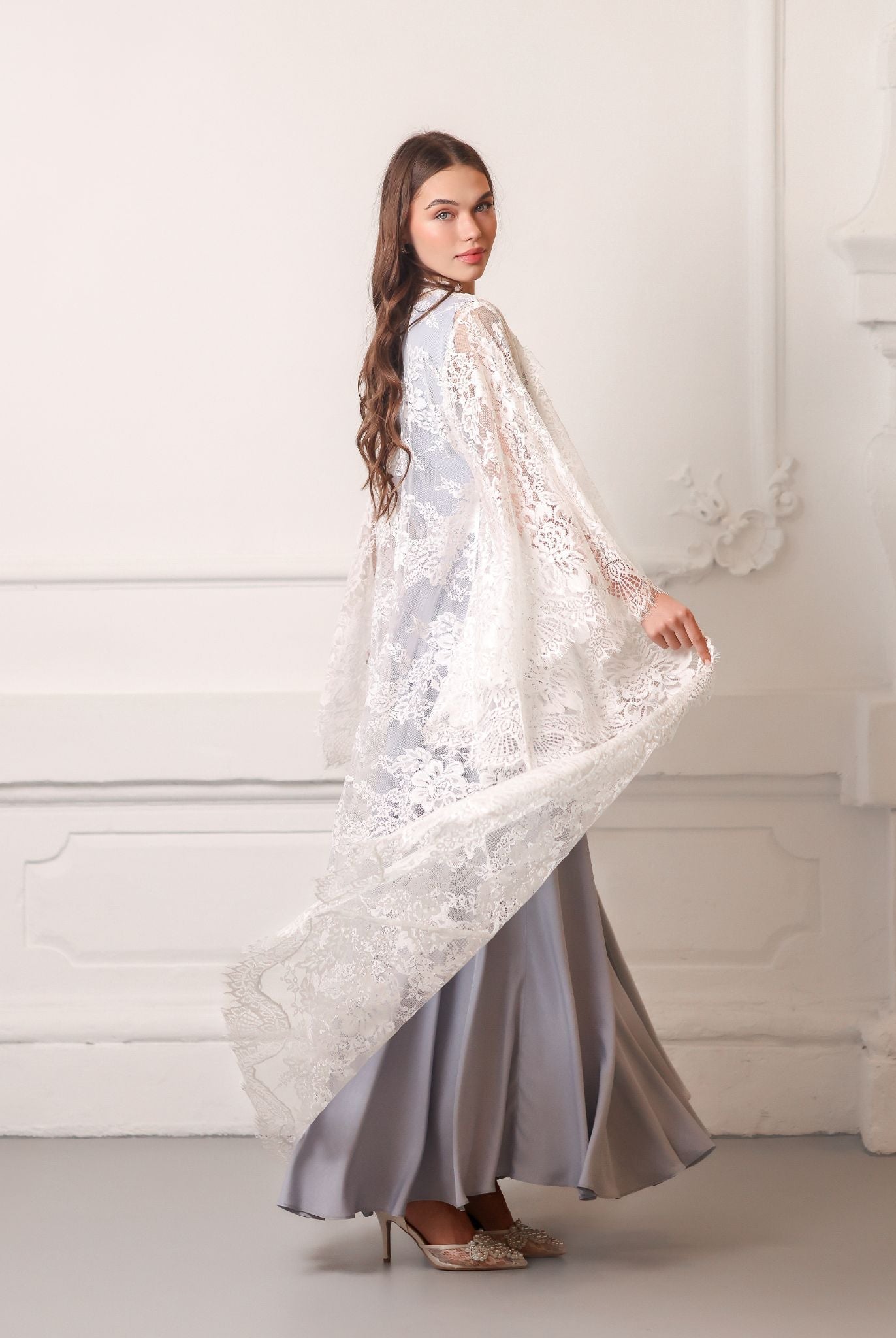 A spinning motion shot from a three-quarter angle, demonstrating the lightweight feel of the fabric.