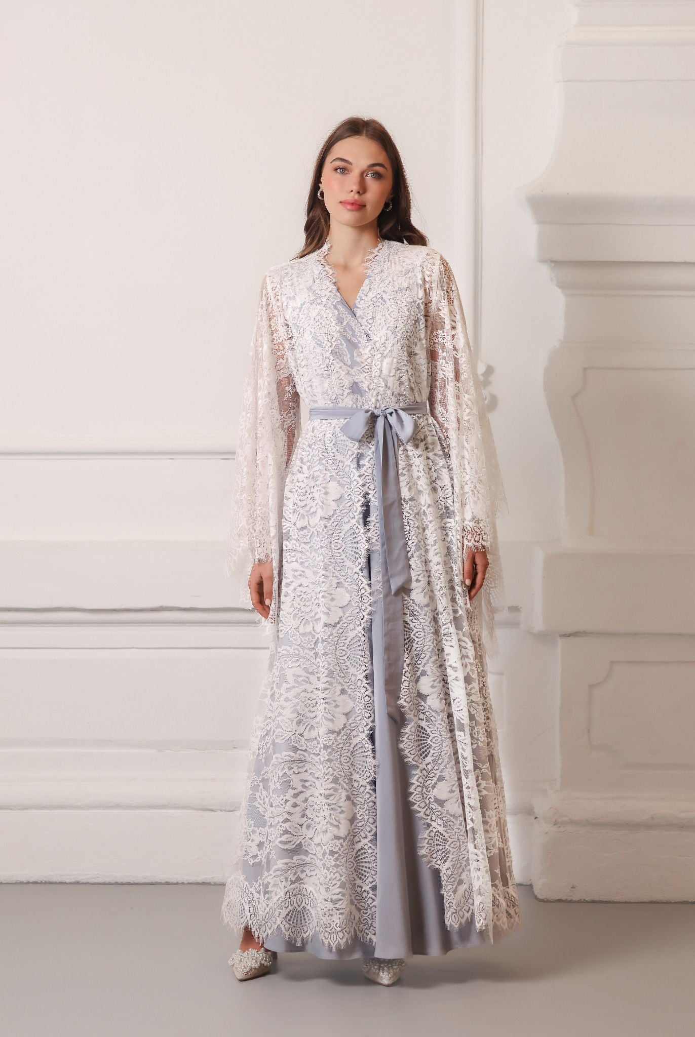 A poised static view of the full wrapped ensemble, illustrating the elegant coverage and soft lines.