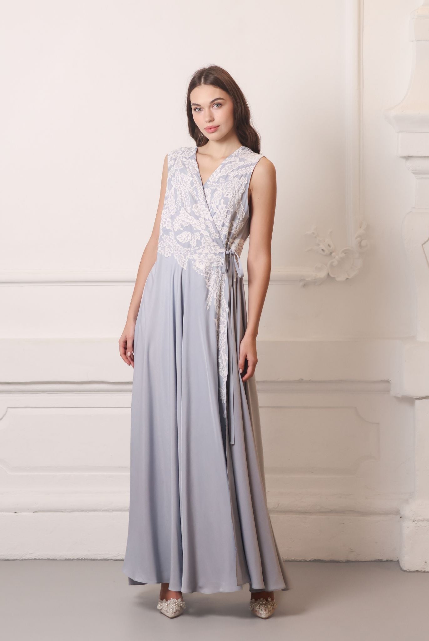 A direct front shot of the nightgown, highlighting the clean neckline designed to accommodate a growing belly.