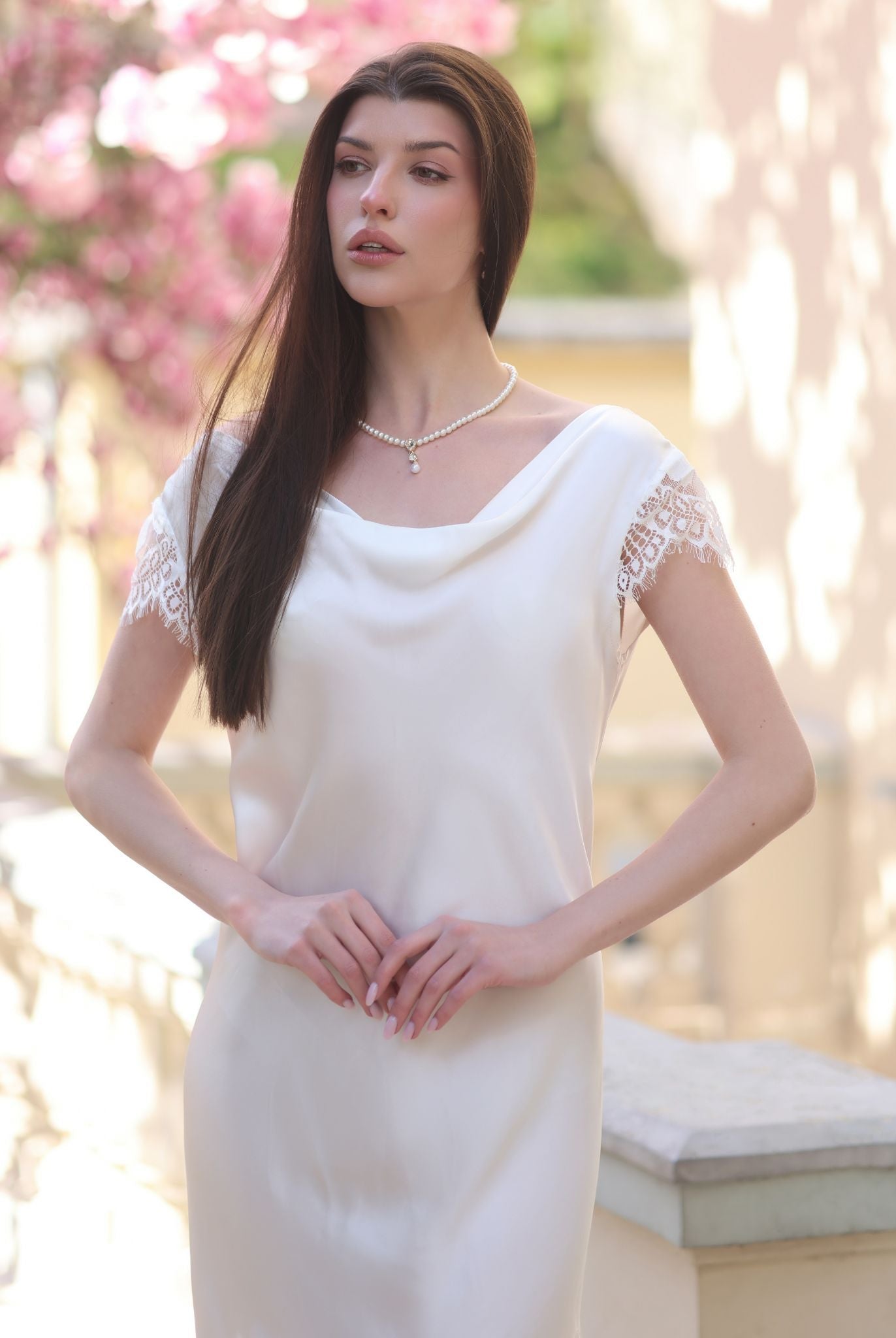 Mid-length shot of the silk nightgown, highlighting the flattering fit and refined feminine drape.