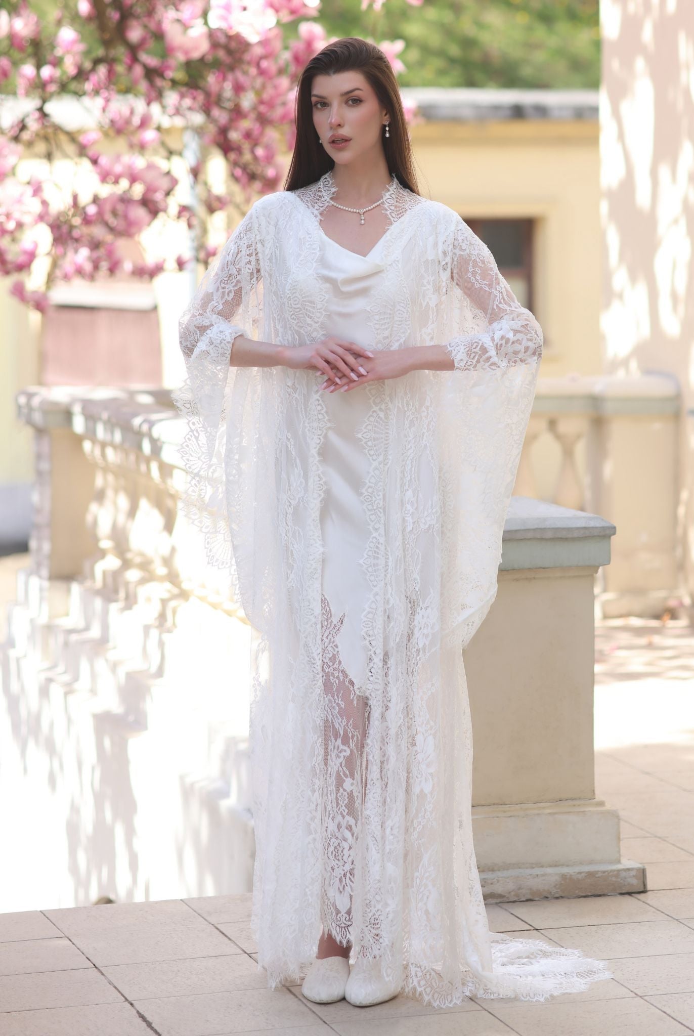 A serene static view of the ensemble, highlighting the elegant wrap-over style and clean neckline of the robe.