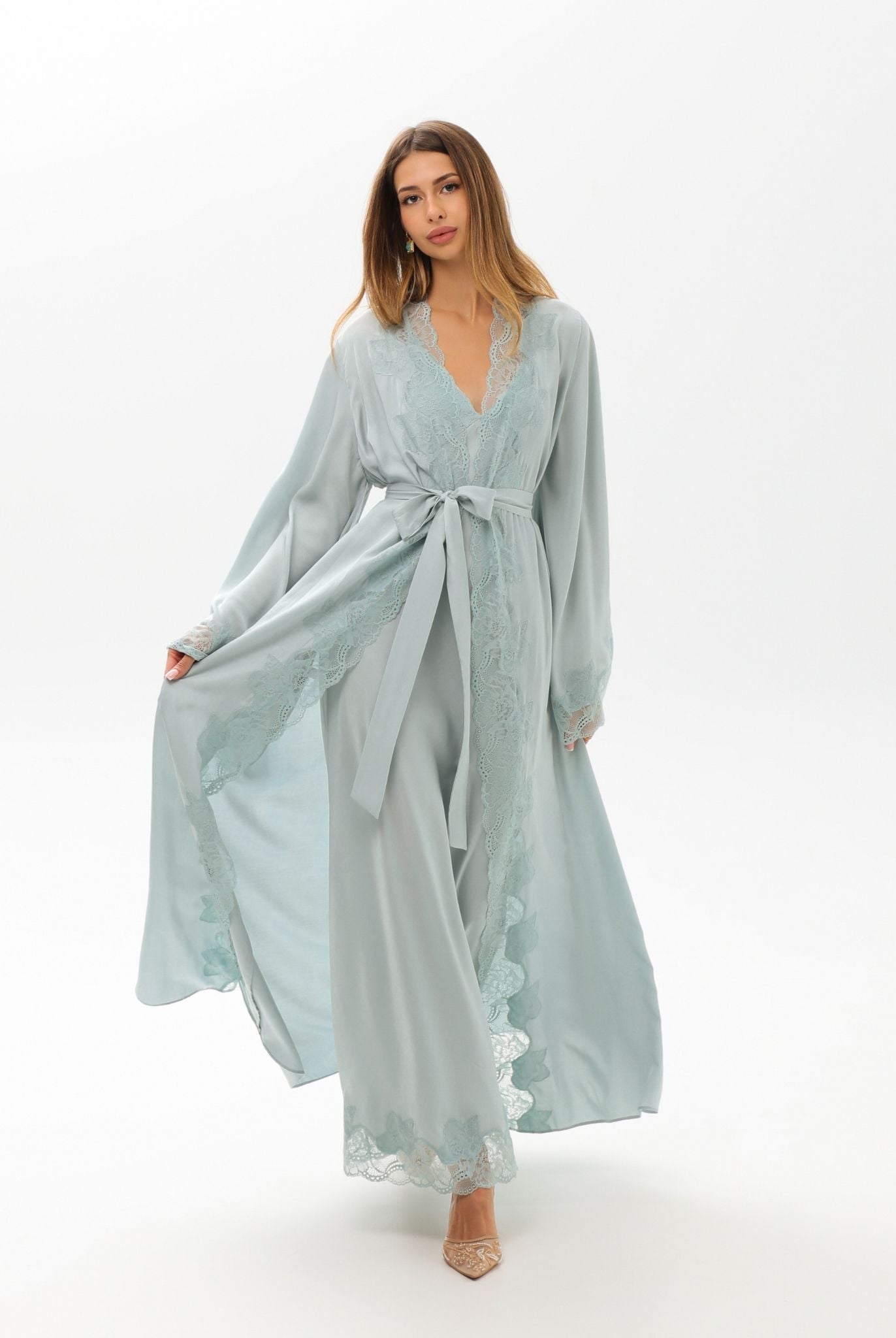 A dynamic view of the Robe and Nightgown Set, illustrating the natural movement and understated luxury of the fabric.