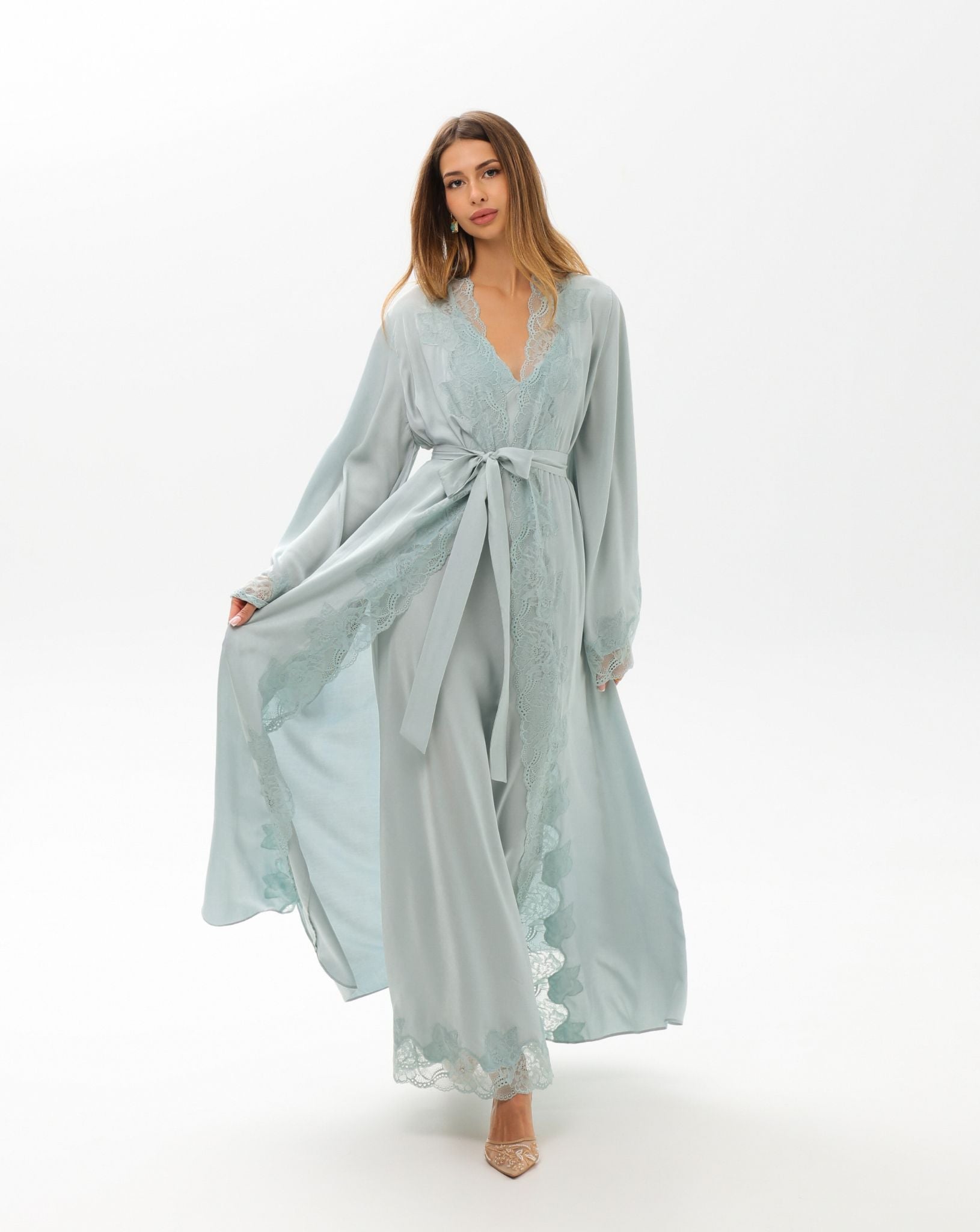 A dynamic view of the Robe and Nightgown Set, illustrating the natural movement and understated luxury of the fabric.