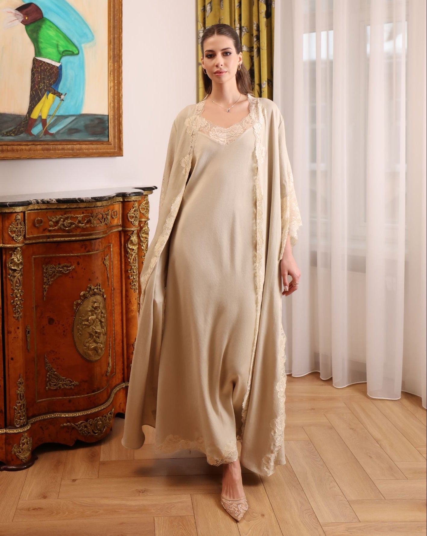 A full-length motion shot of the Cotton Robe ensemble, capturing the graceful movement and breathable fabric.