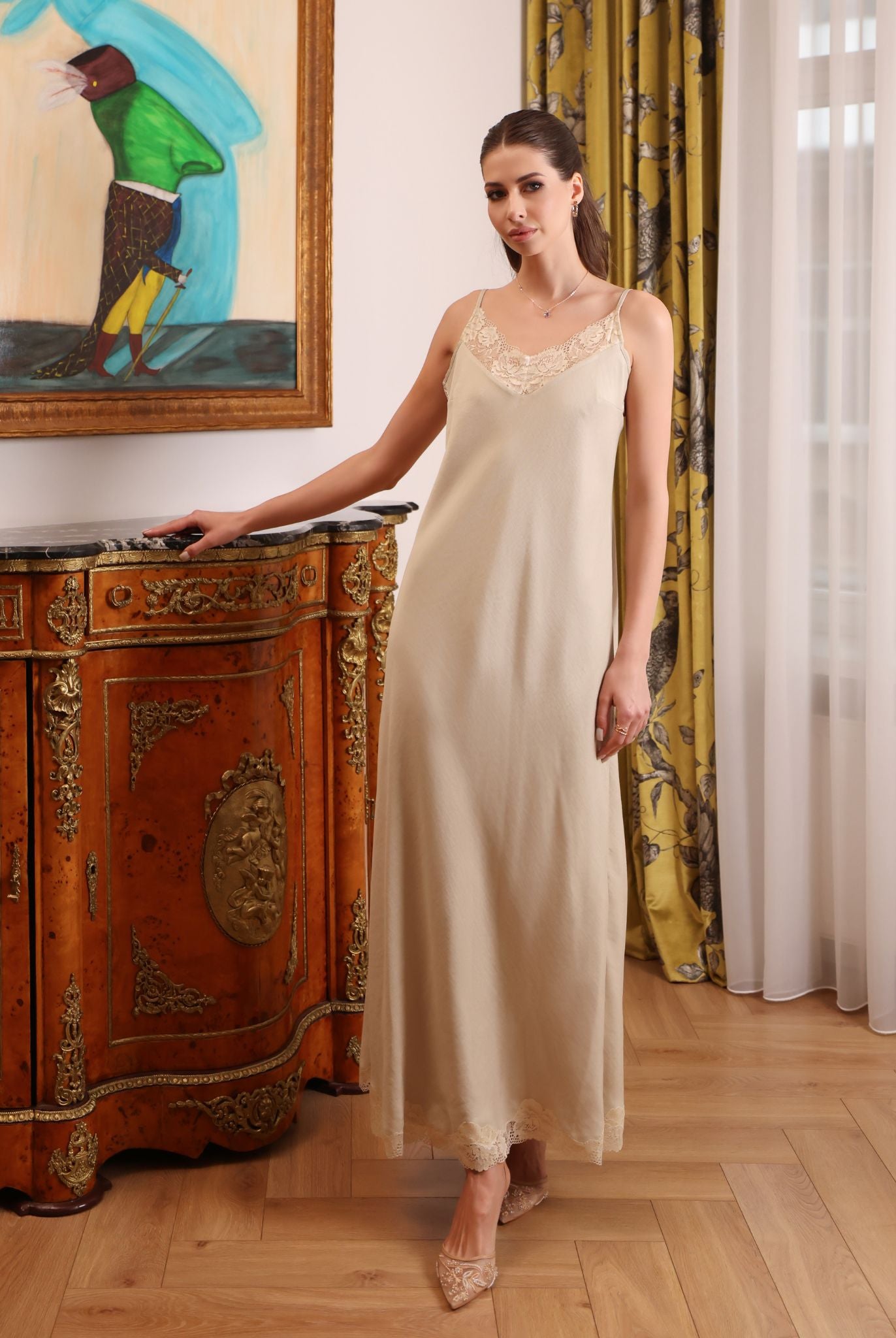 Frontal view of the nightdress featuring adjustable shoulder straps and lace with a subtle, elegant shimmer.