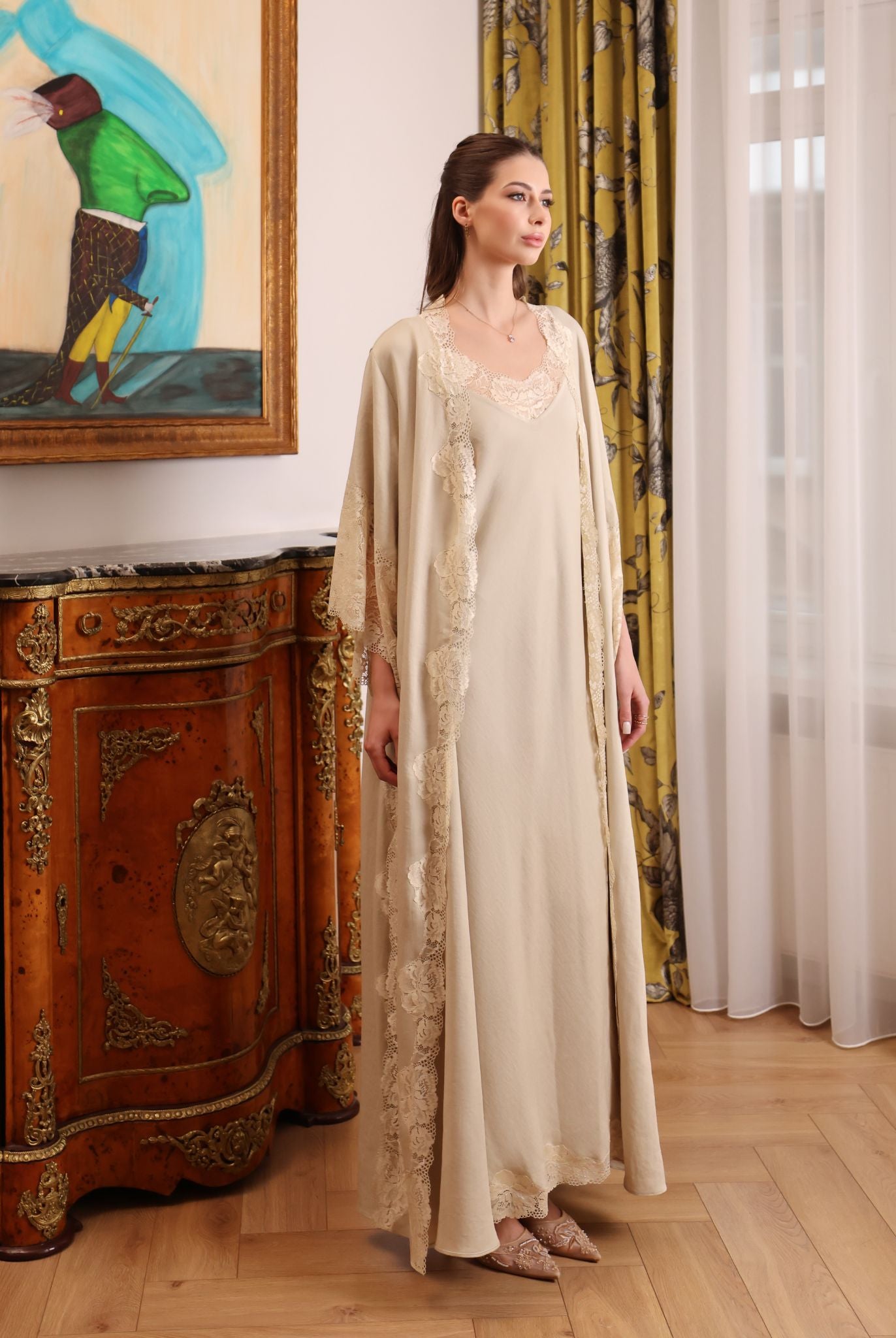 A static full-height view of the layered nightwear, designed for living slowly and feeling composed at home.